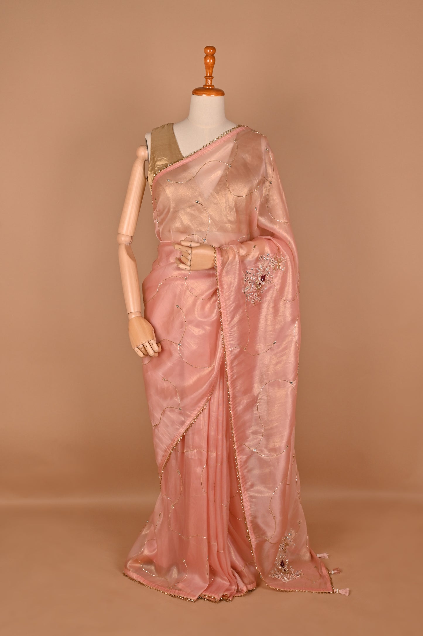 Peach Shimmer Saree with Zardozi Work and Gold Tassels