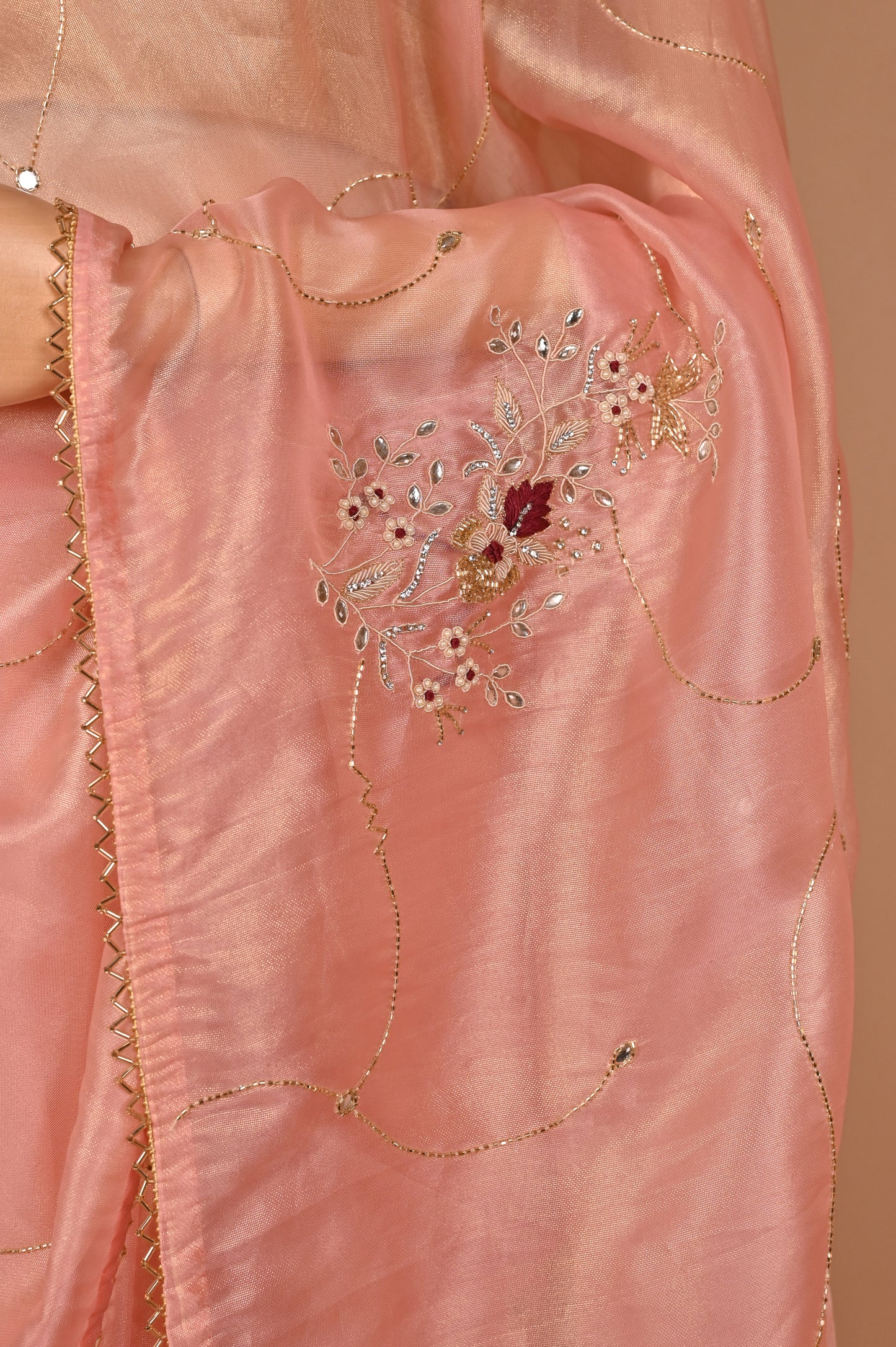 Peach Shimmer Saree with Zardozi Work and Gold Tassels