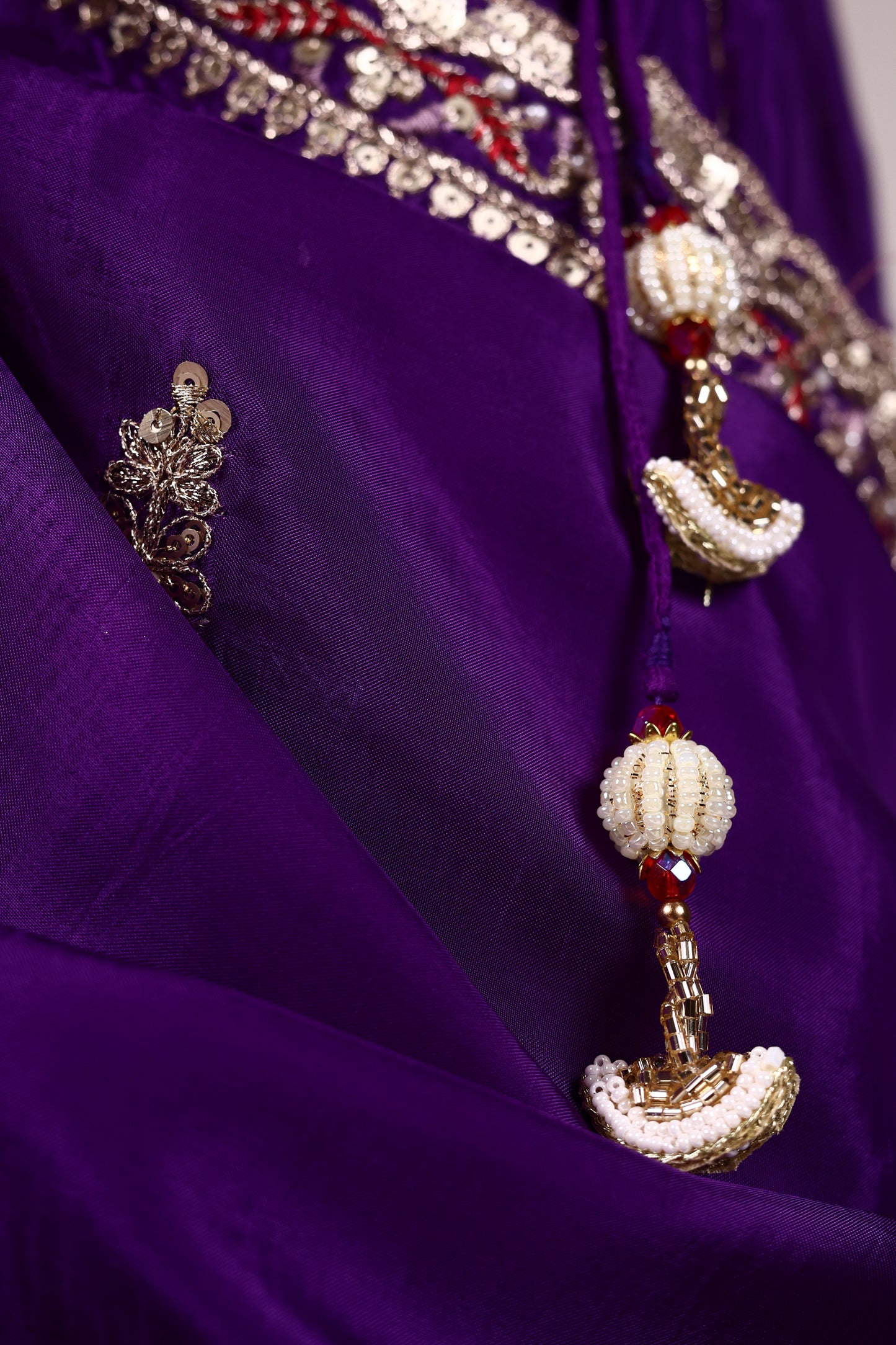 Purple Shantoon Lehenga with Pearl, Tikki & Zari Embroidery and Lace‑Bordered Dupatta
