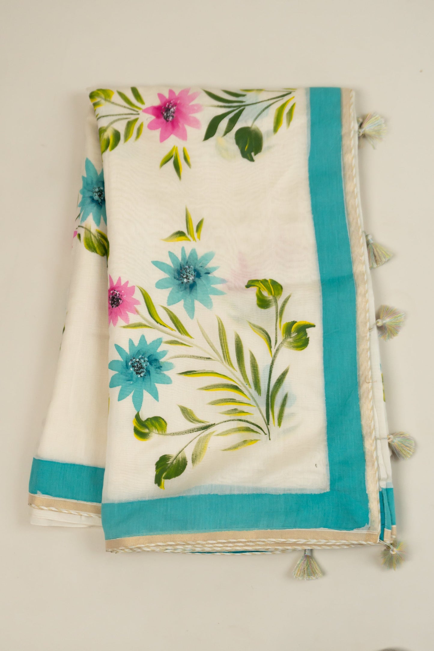 Natural White Cotton Mull Hand-Painted Saree with Lurex Tissue Piping, Facing, and Multi-Colored Tassels on Saree and Blouse