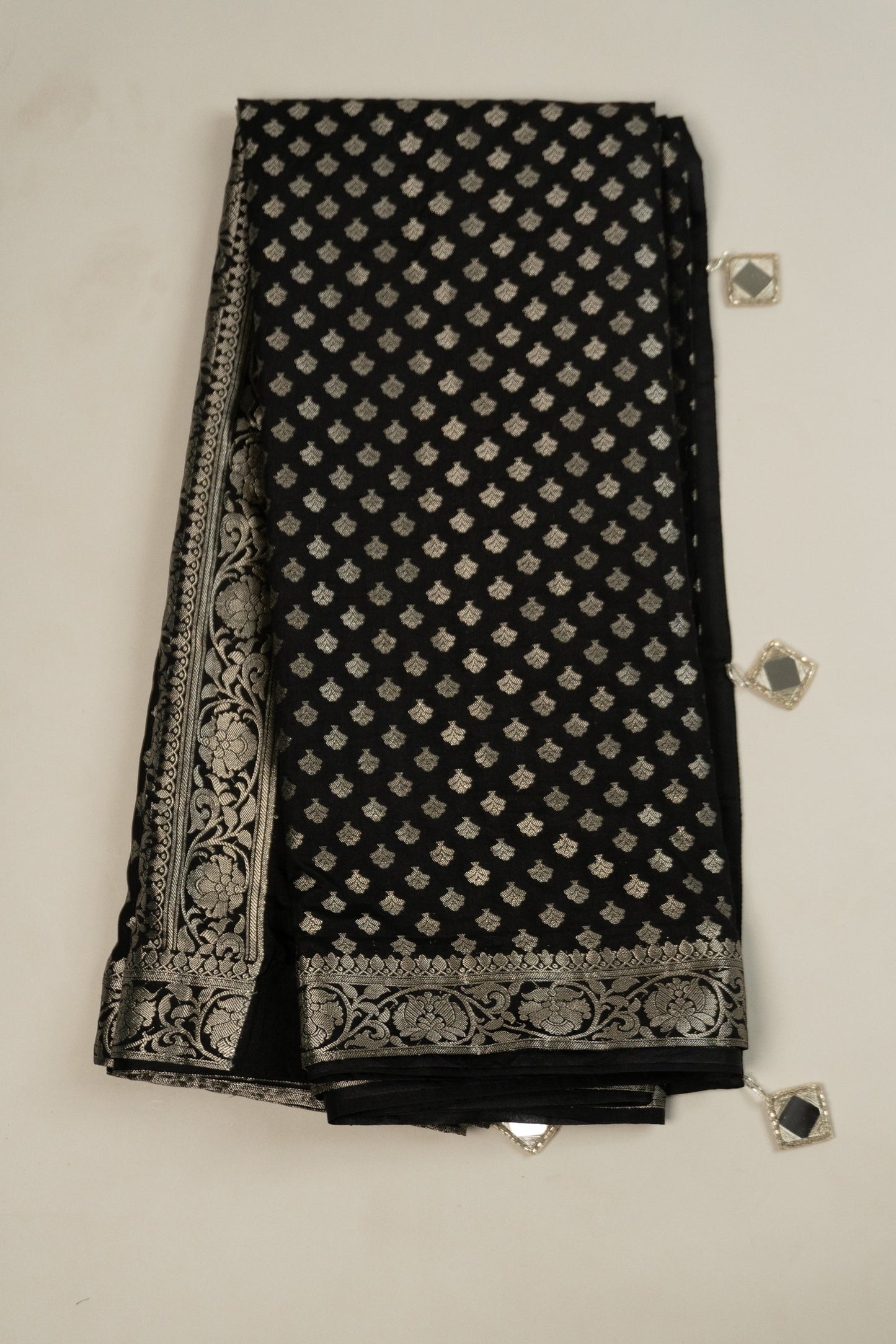 Black Banarasi Zari Butta Art Silk Saree with Satin Silk Facing and Mirror Katdana Tassels on Pallu