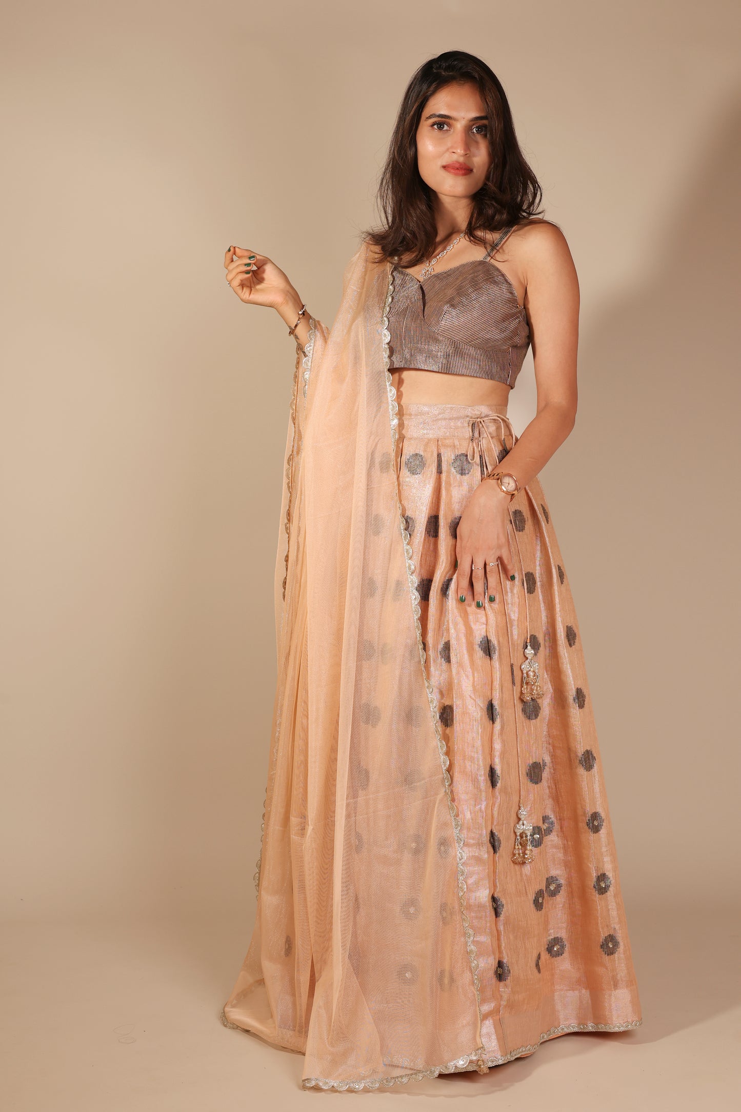 Peach Linen Tissue Lehenga with Sequins Embroidery and Net Dupatta