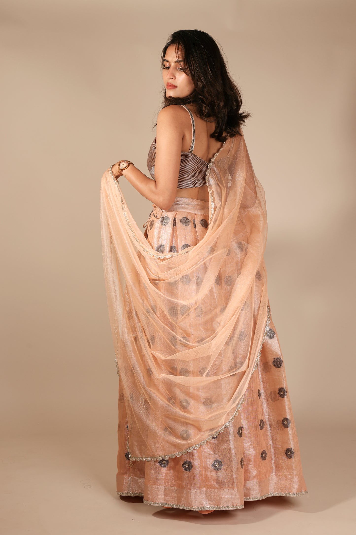 Peach Linen Tissue Lehenga with Sequins Embroidery and Net Dupatta