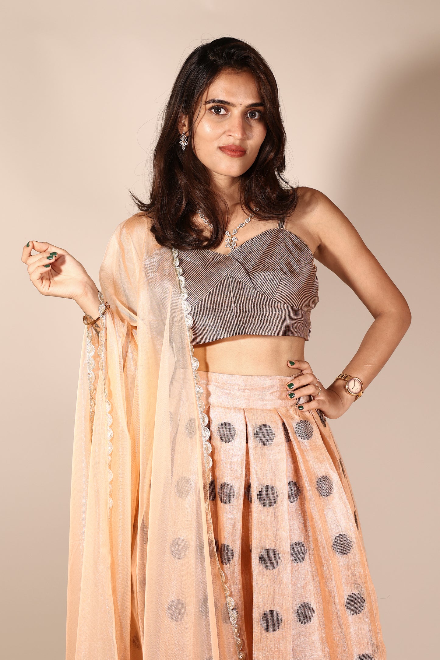 Peach Linen Tissue Lehenga with Sequins Embroidery and Net Dupatta