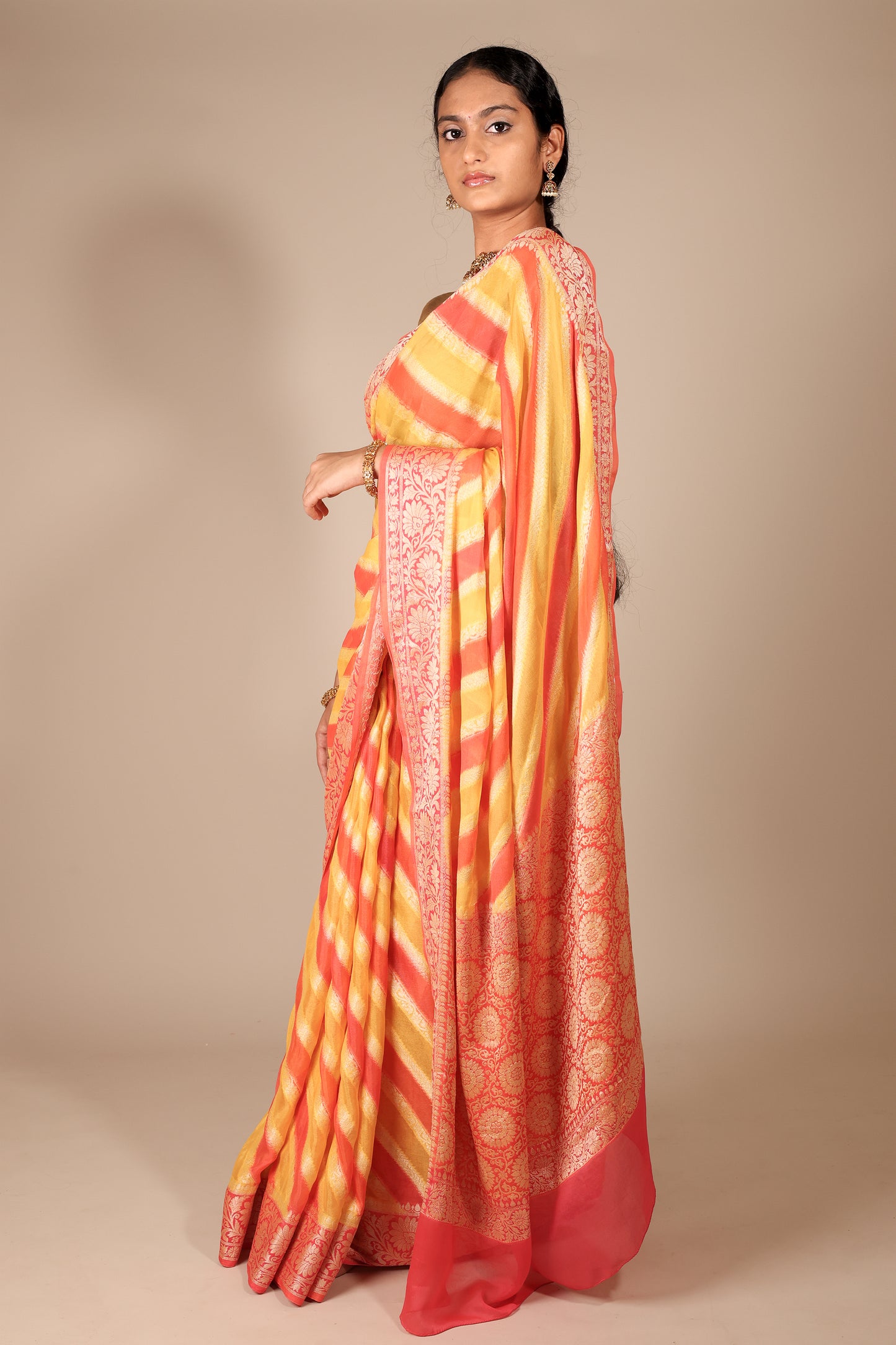 Vibrant Yellow and Coral Banarasi Crepe Georgette Saree with Diagonal Stripes