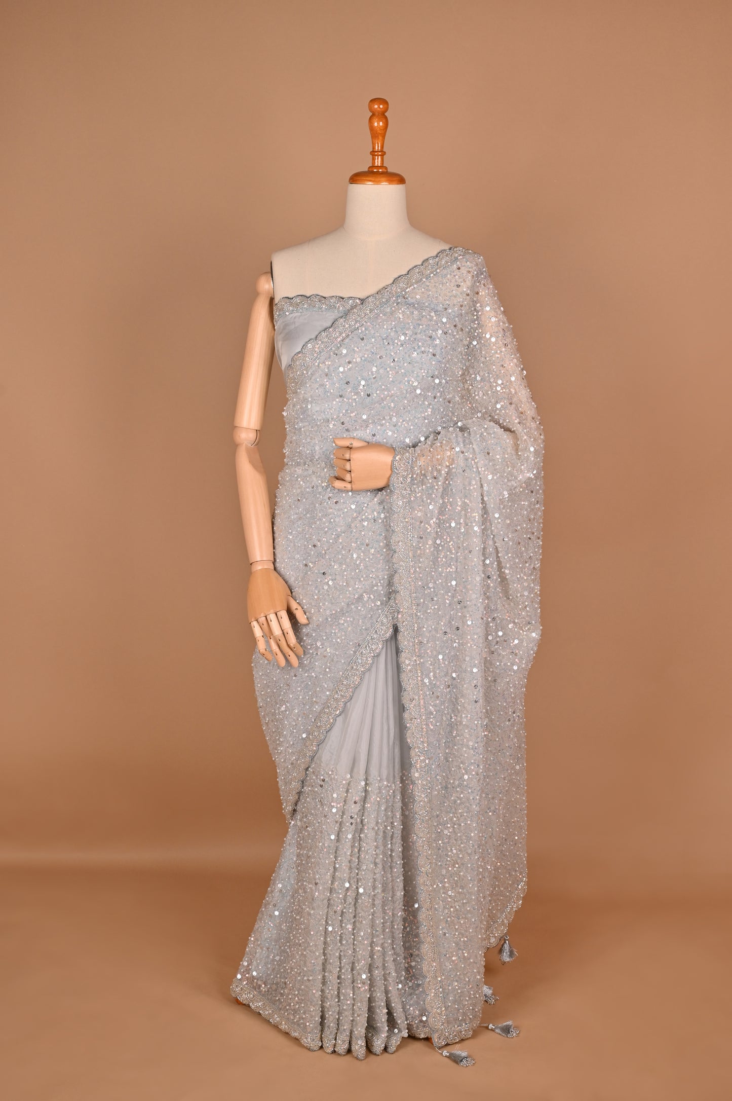 Enchanted Silver Shimmer Saree with Tassels embroidered in Sequins and Pearls