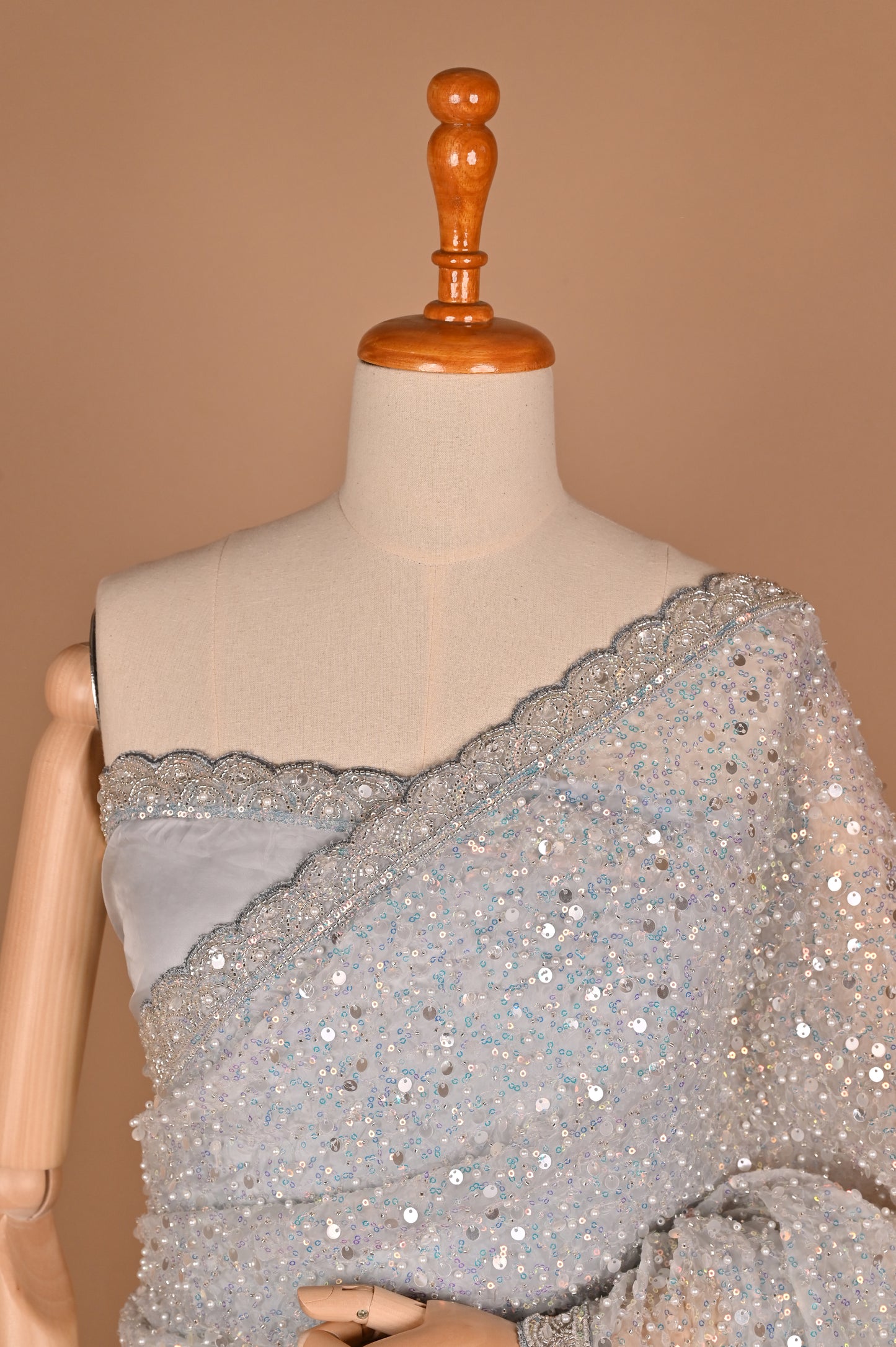 Enchanted Silver Shimmer Saree with Tassels embroidered in Sequins and Pearls