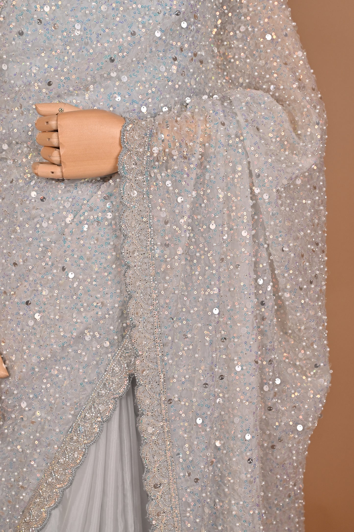Enchanted Silver Shimmer Saree with Tassels embroidered in Sequins and Pearls