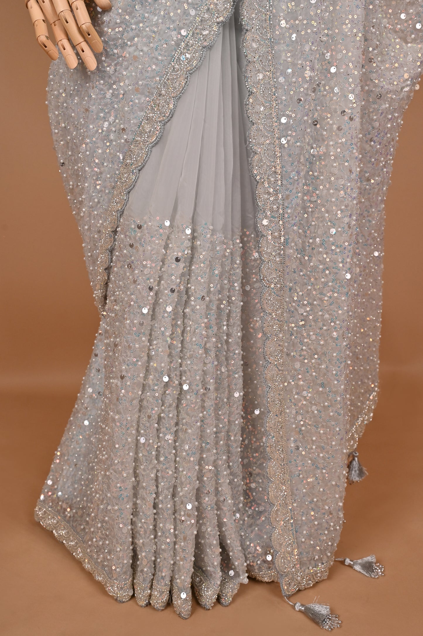 Enchanted Silver Shimmer Saree with Tassels embroidered in Sequins and Pearls