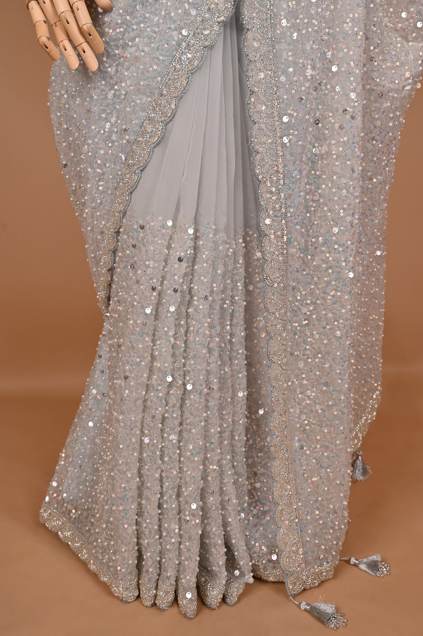 Enchanted Silver Shimmer Saree with Tassels embroidered in Sequins and Pearls