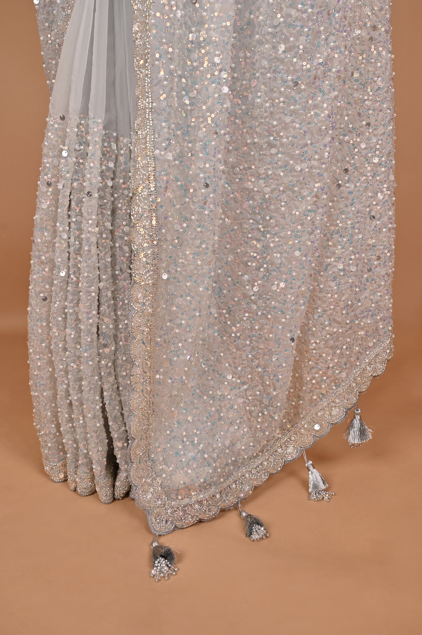 Enchanted Silver Shimmer Saree with Tassels embroidered in Sequins and Pearls