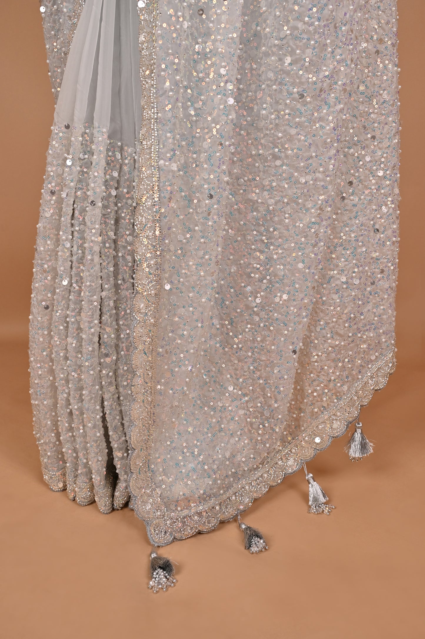 Enchanted Silver Shimmer Saree with Tassels embroidered in Sequins and Pearls
