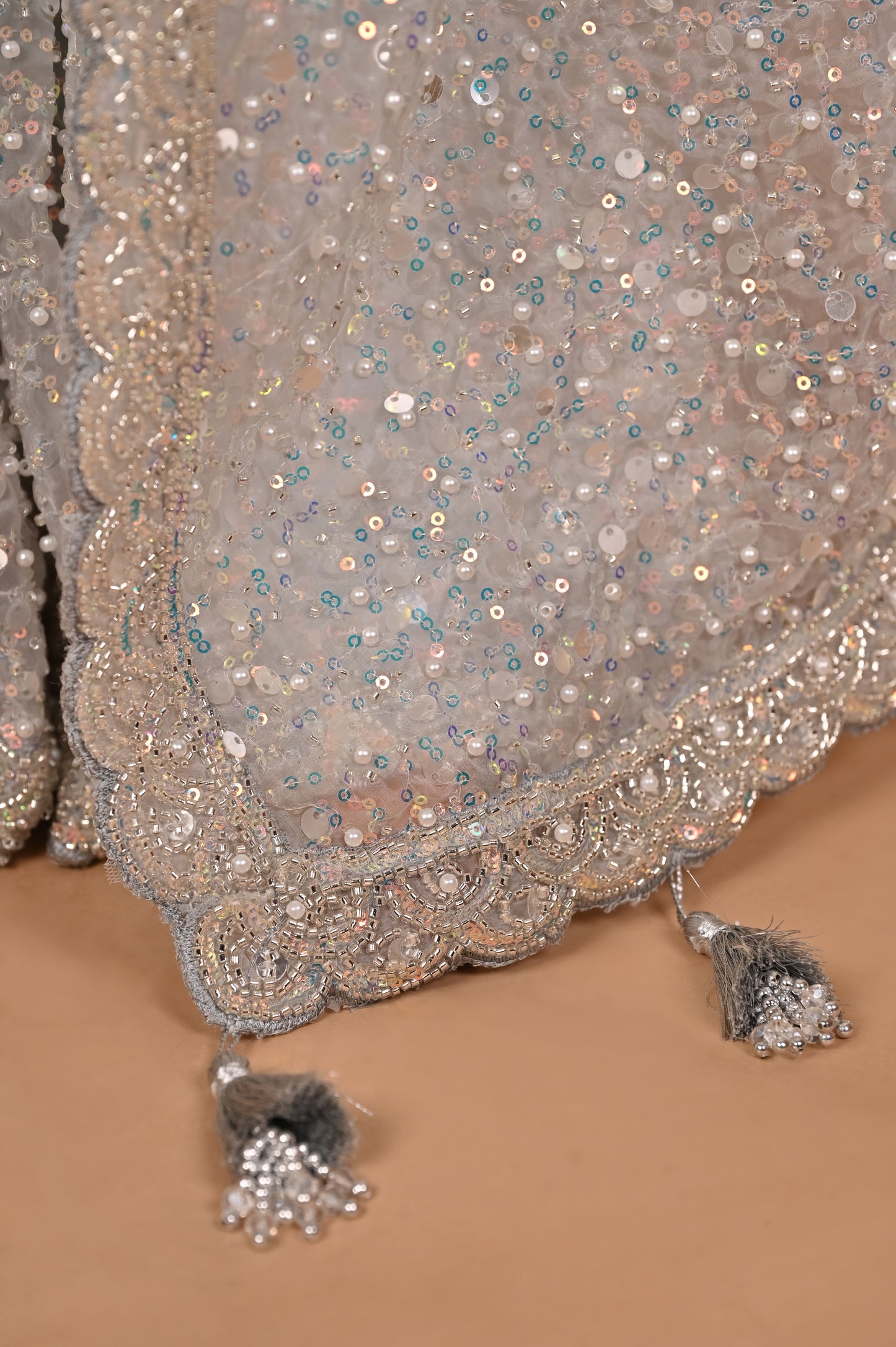 Enchanted Silver Shimmer Saree with Tassels embroidered in Sequins and Pearls