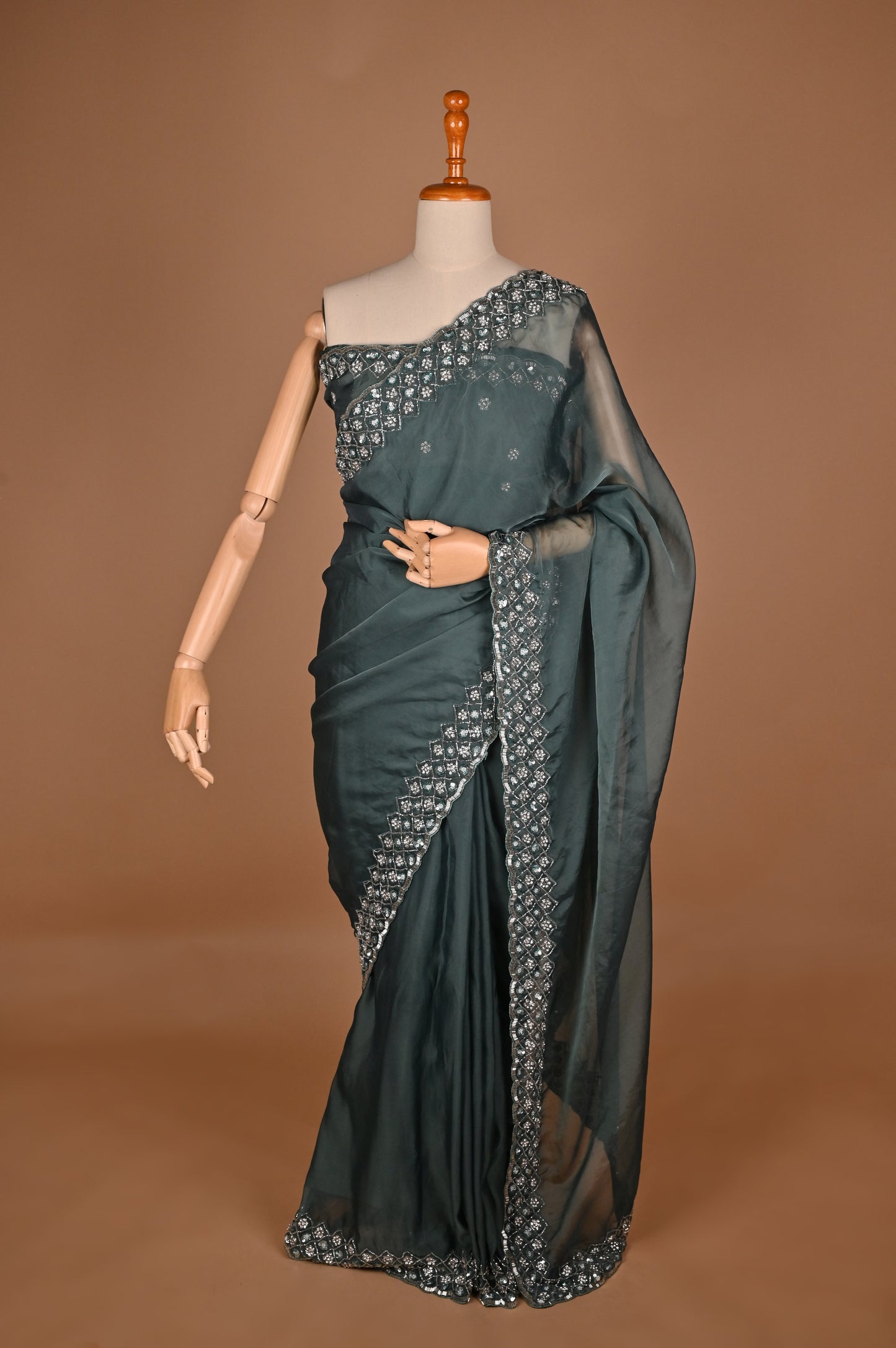 Enchanted Teal Blue Organza Saree with Hand Embroidery