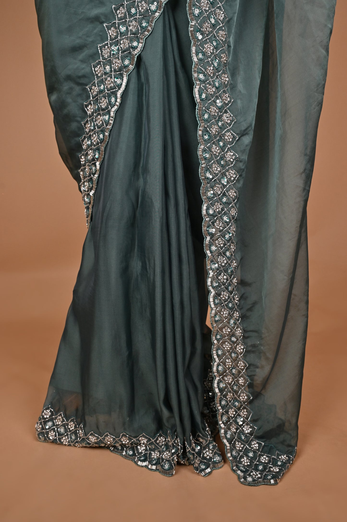 Enchanted Teal Blue Organza Saree with Hand Embroidery