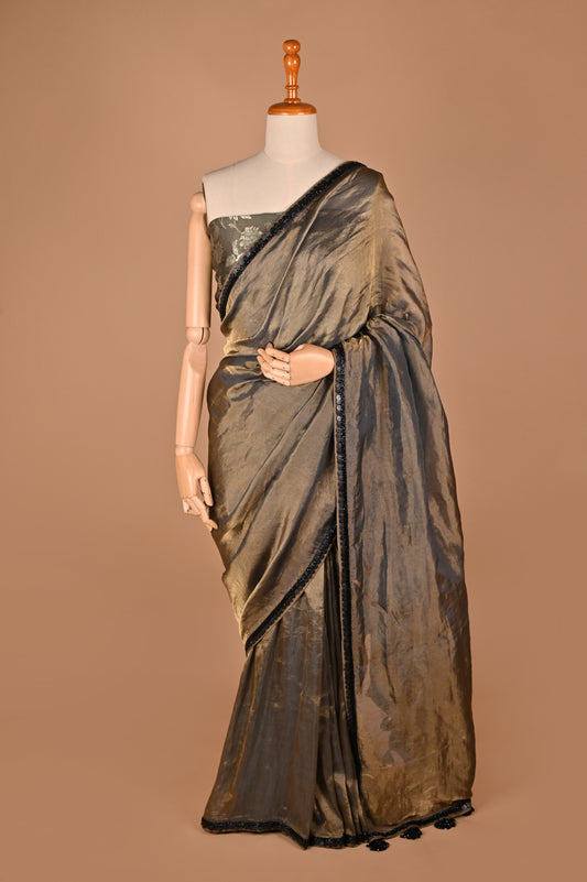 Sophisticated Grey Tissue Saree with Elegant Tassel Details