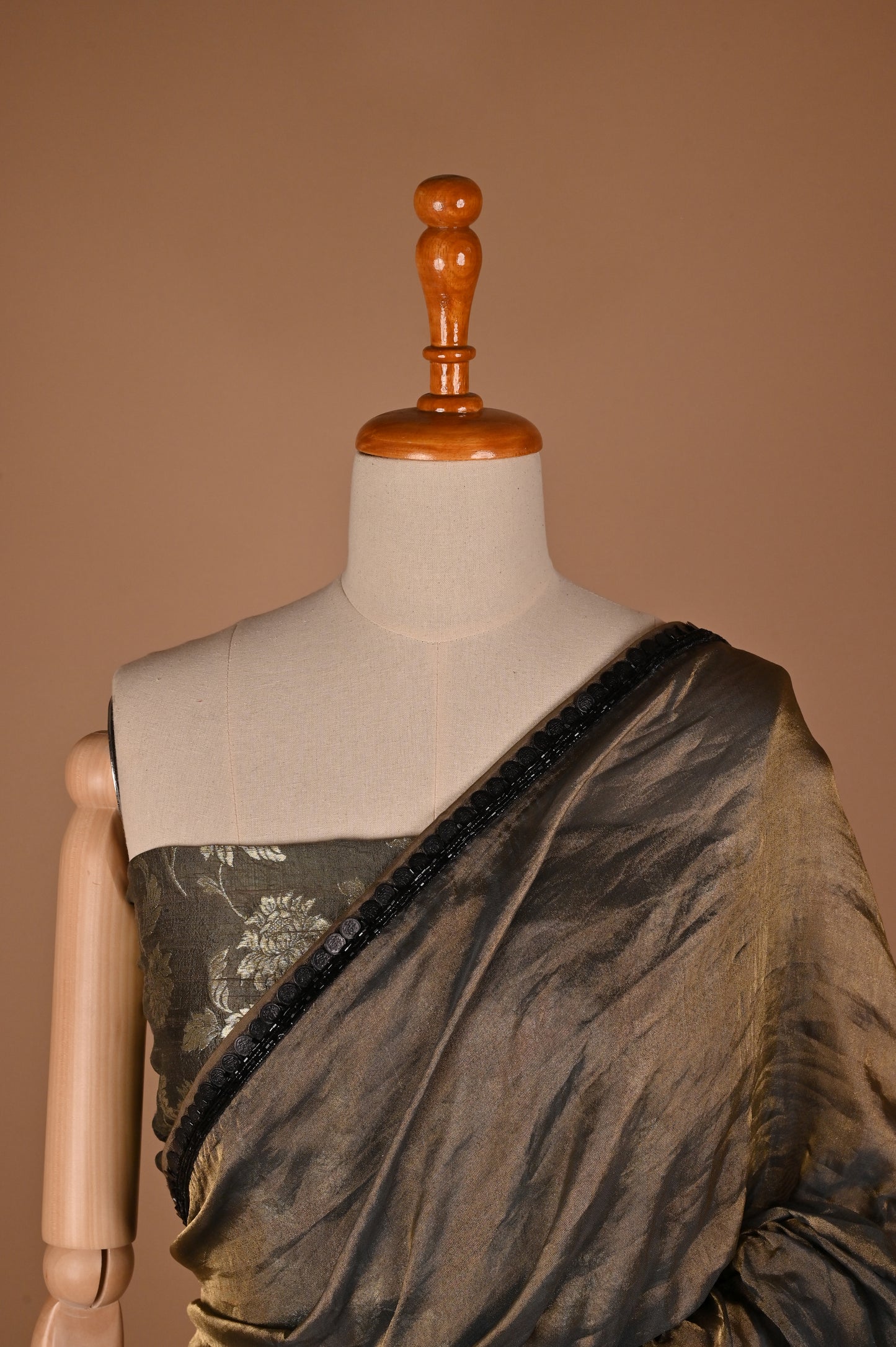 Sophisticated Grey Tissue Saree with Elegant Tassel Details