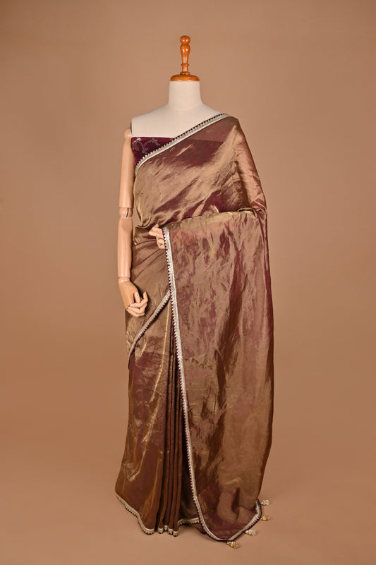 Luxurious Gold and Wine Tissue Saree with Elegant Tassel Details