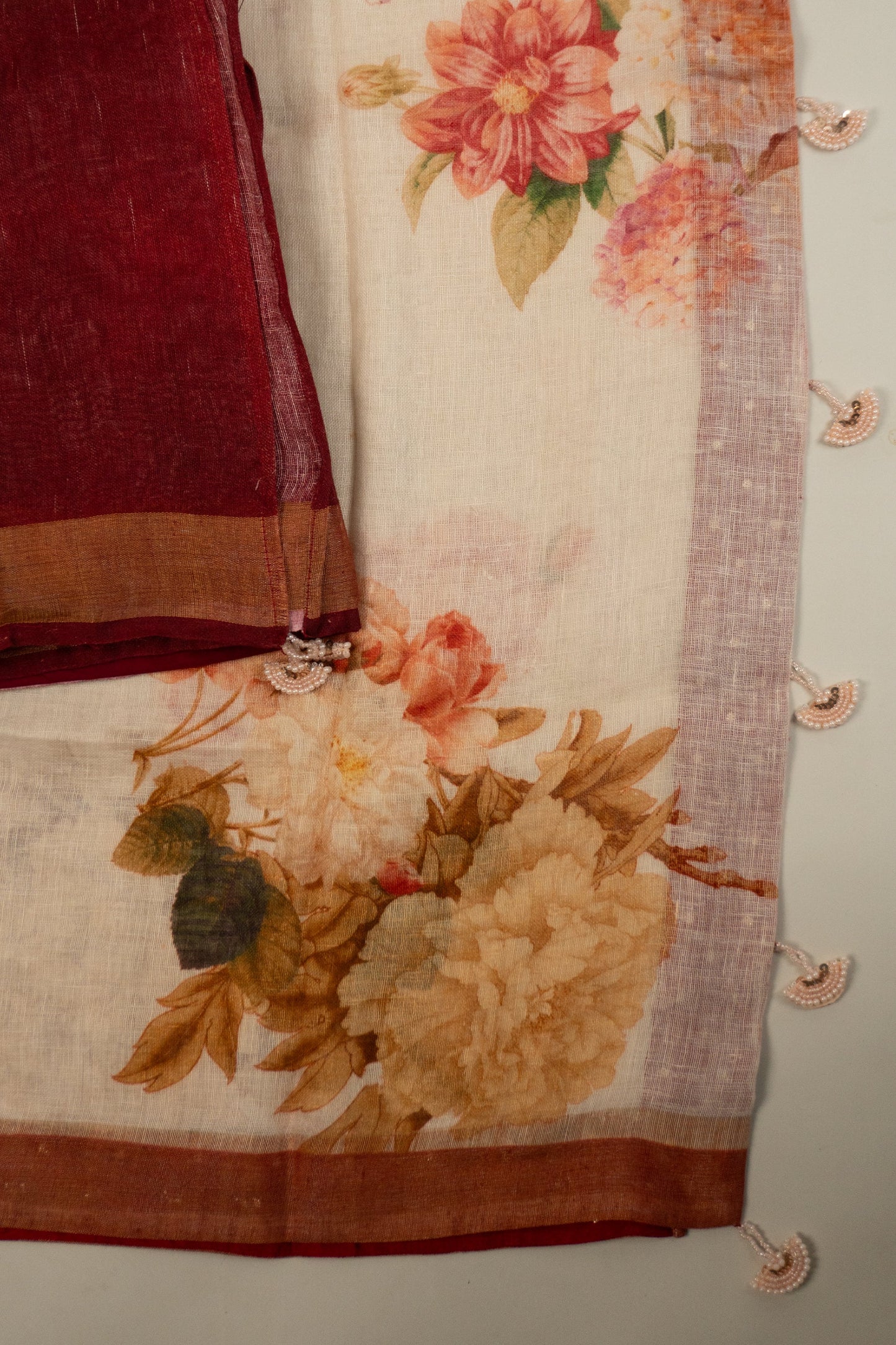 Cream and Maroon Linen Saree with Brocade Facing and Pearl Tassels on Pallu