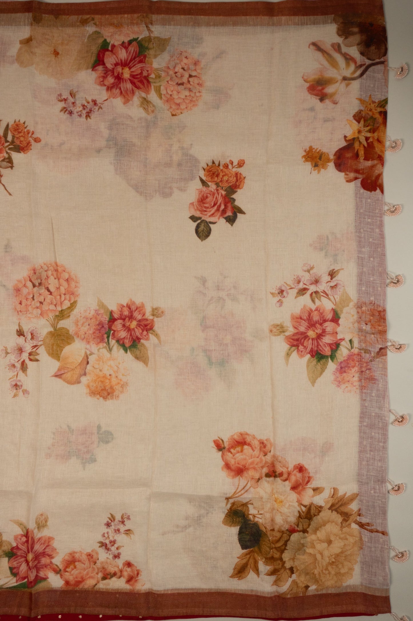 Cream and Maroon Linen Saree with Brocade Facing and Pearl Tassels on Pallu