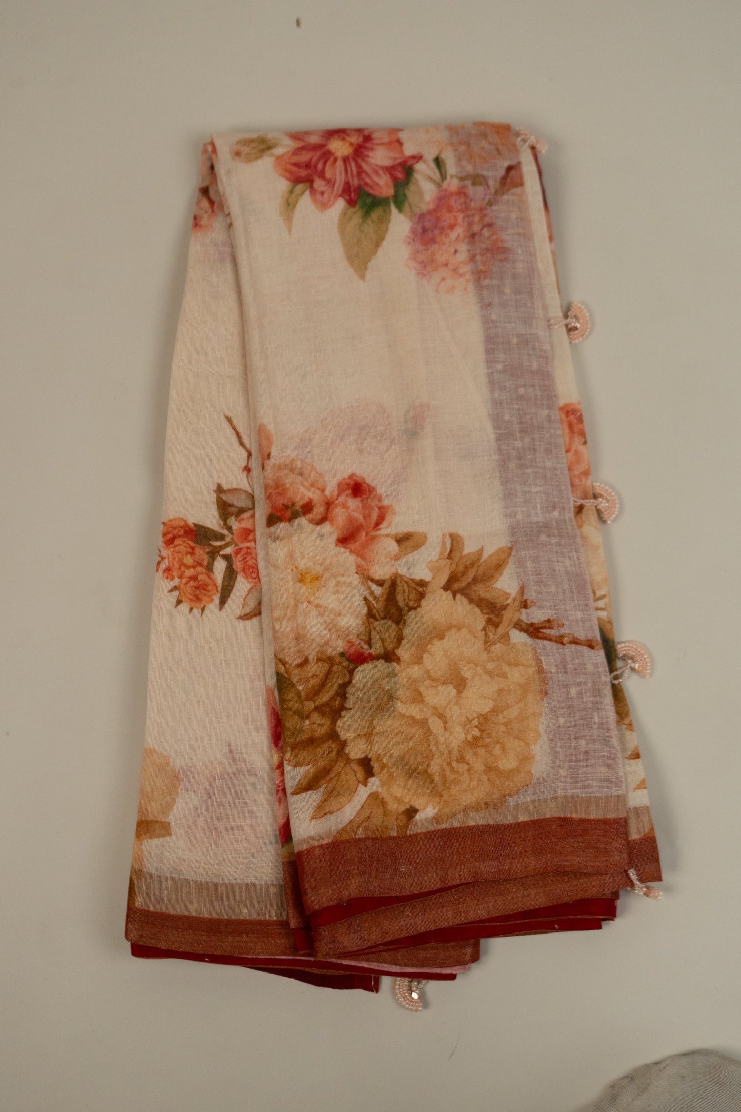 Cream and Maroon Linen Saree with Brocade Facing and Pearl Tassels on Pallu