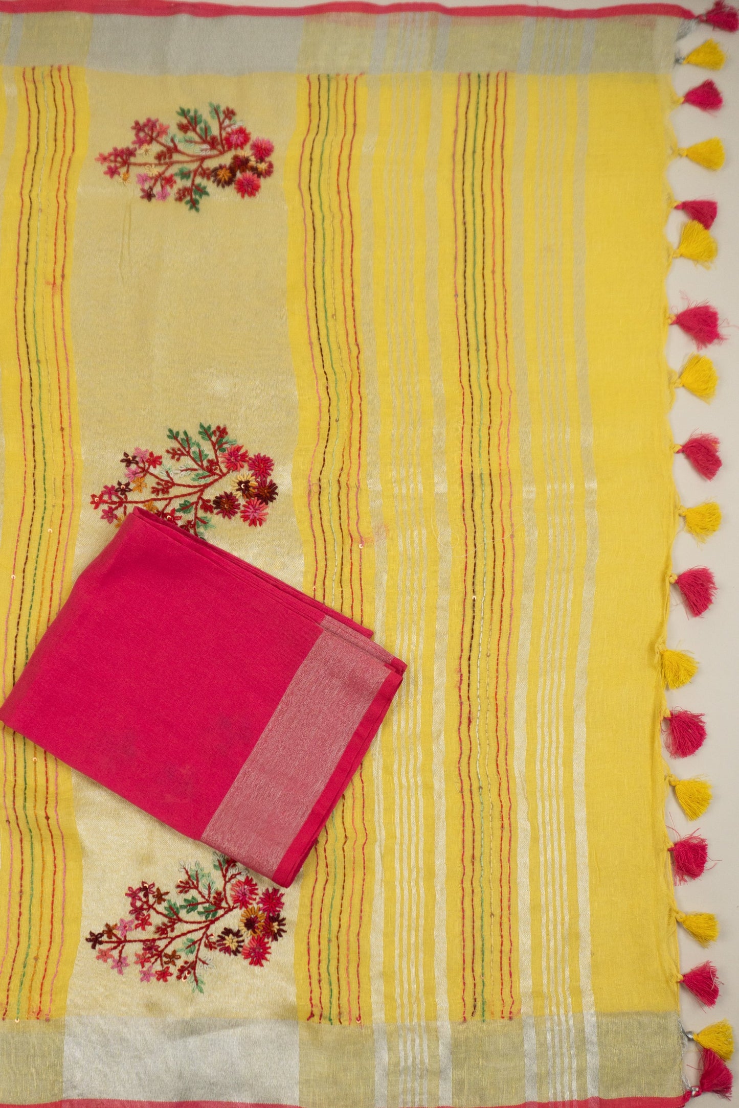Yellow and Magenta Linen Saree with Embroidered Floral Buttas