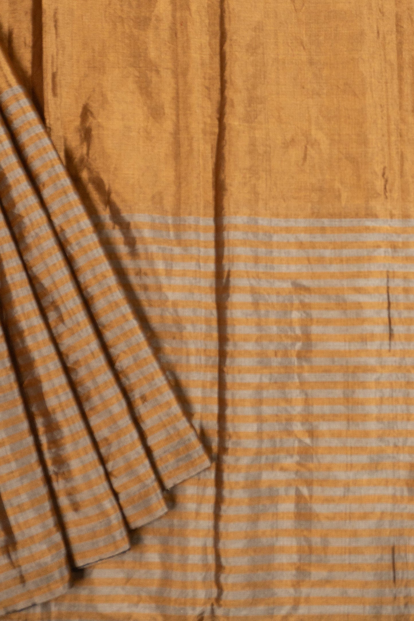 Gold Chanderi Silk Tissue Saree with Stripe and Plain Effect, Brocade Silk Contrast Navy Blue Facing, and Katdana Tassels in Pallu and Blouse