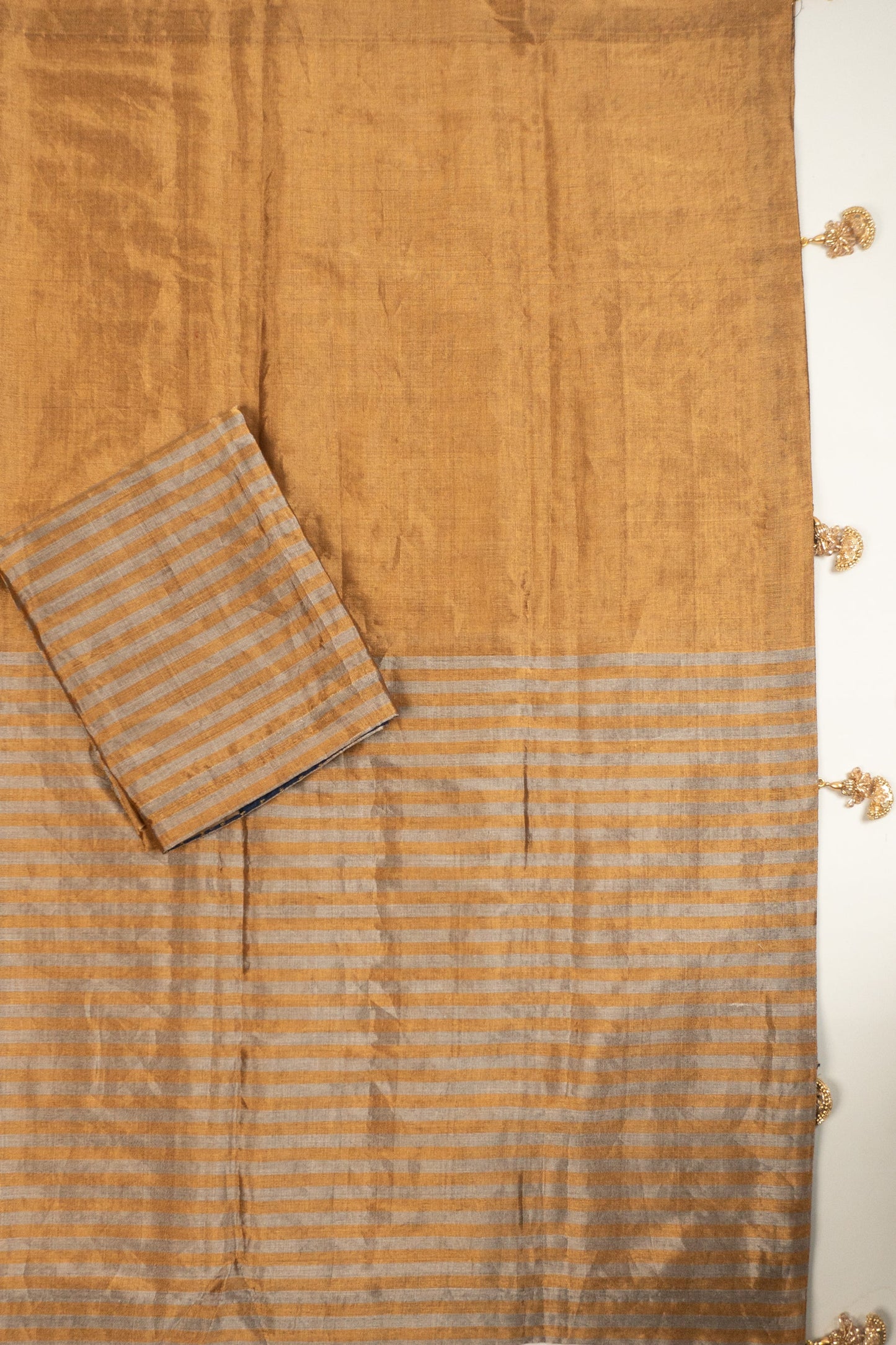 Gold Chanderi Silk Tissue Saree with Stripe and Plain Effect, Brocade Silk Contrast Navy Blue Facing, and Katdana Tassels in Pallu and Blouse