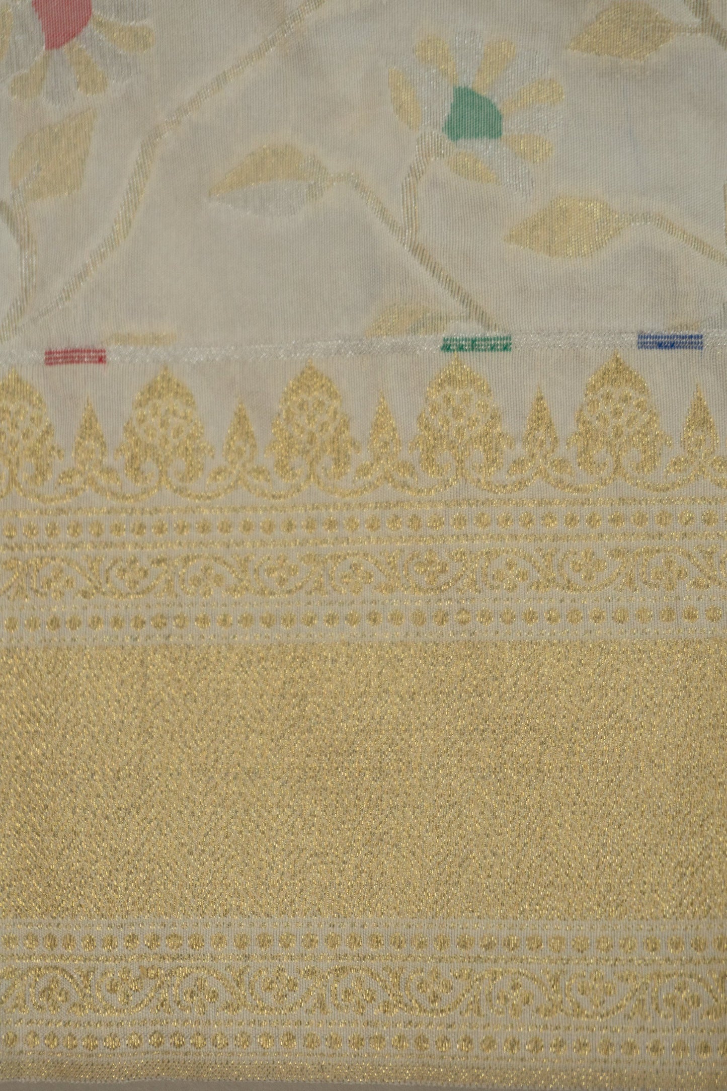 White Banarasi Silk Saree with Pastel Shades, Gold Tissue Facing, Intricate Floral Jaal Weave, and Pearl & Gold Tassels on Saree and Blouse