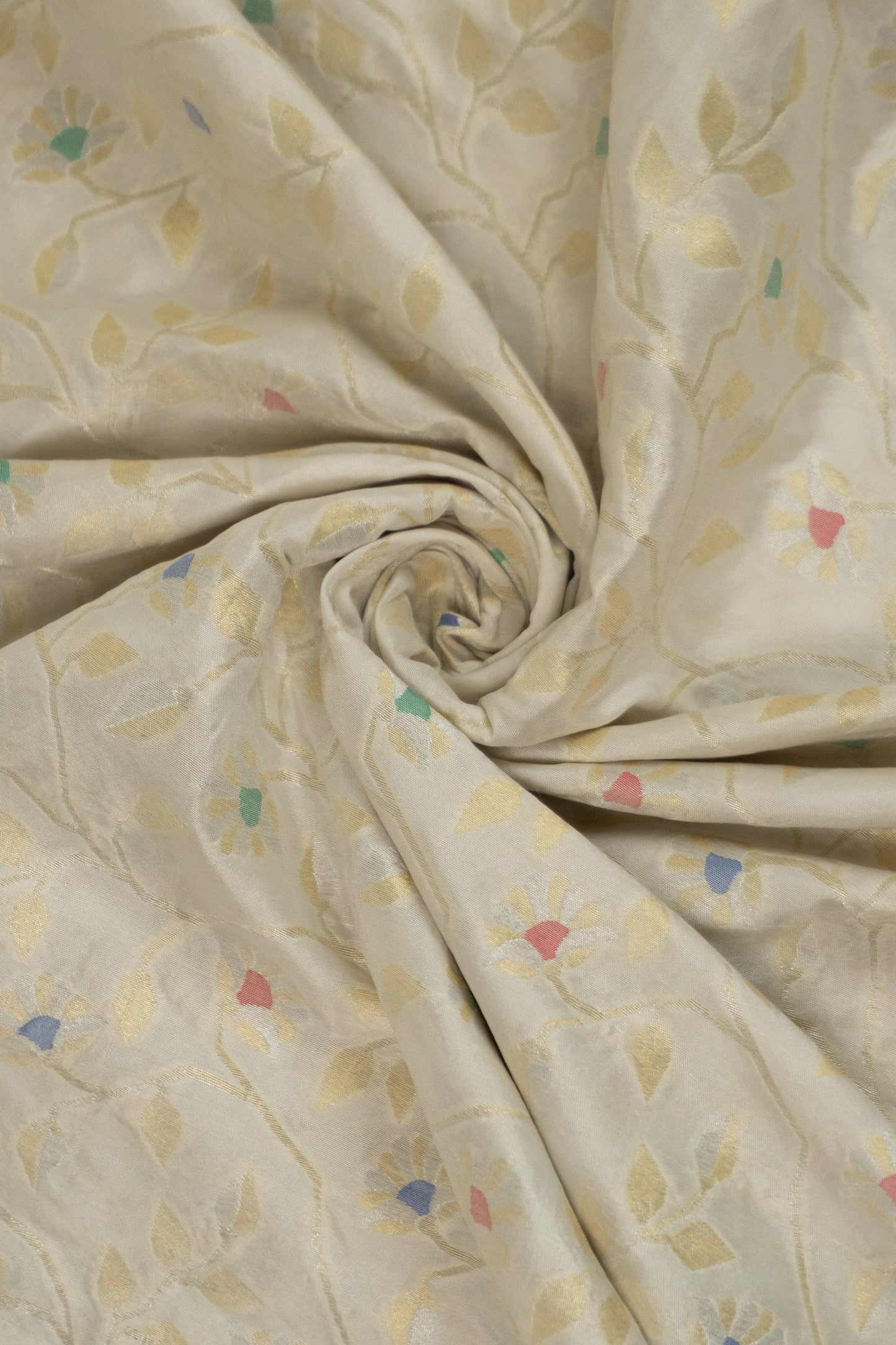 White Banarasi Silk Saree with Pastel Shades, Gold Tissue Facing, Intricate Floral Jaal Weave, and Pearl & Gold Tassels on Saree and Blouse