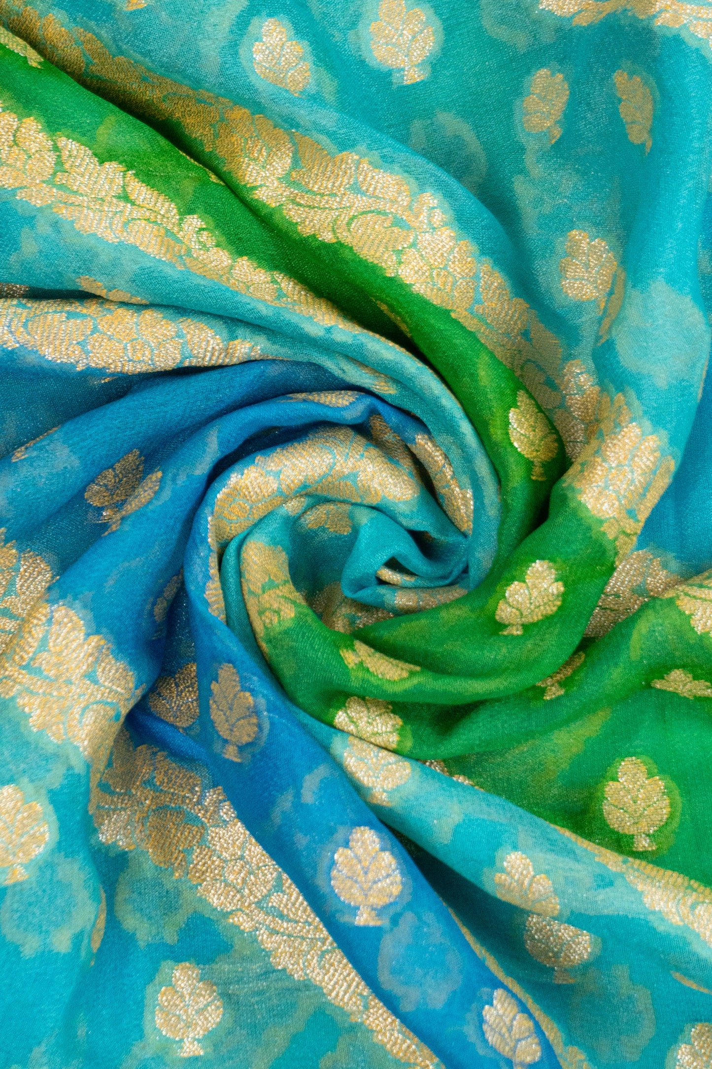 Multi-Colored Banarasi Silk Georgette Saree in Blue and Green with Gold Tissue Facing, Zari, and Pearl Tassels on Saree and Blouse