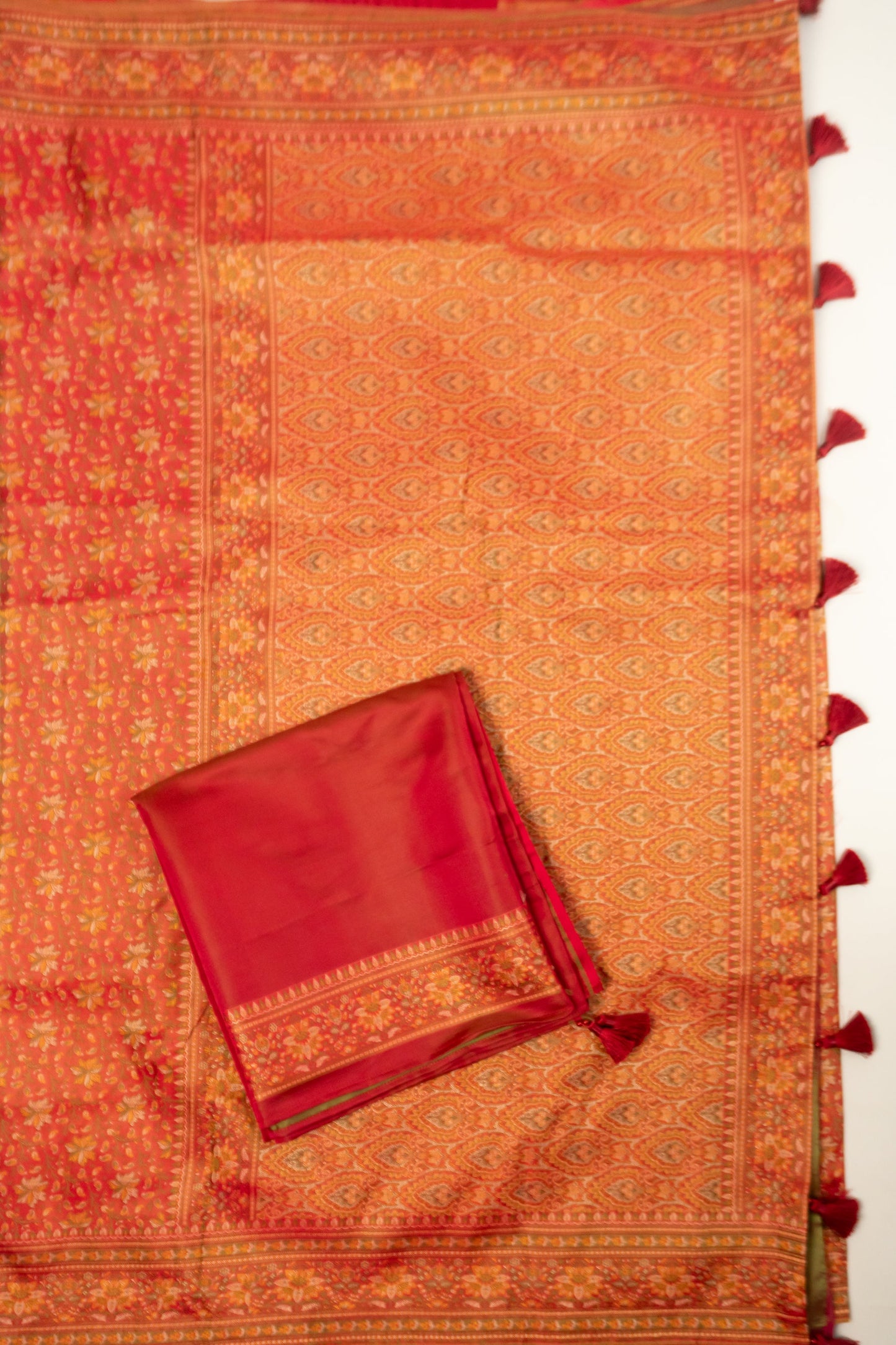 Red and Green Dhoop Chaav Banarasi Silk Saree with All-Over Floral Weaving, Plain Silk Facing, and Tassels on Pallu and Blouse