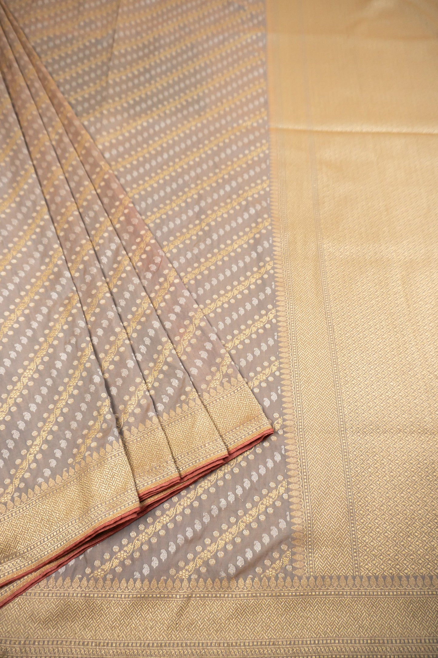 Grey, White, and Gold Banarasi Silk Saree with Butta, Plain Silk Facing, and Tassels on Pallu and Sleeves