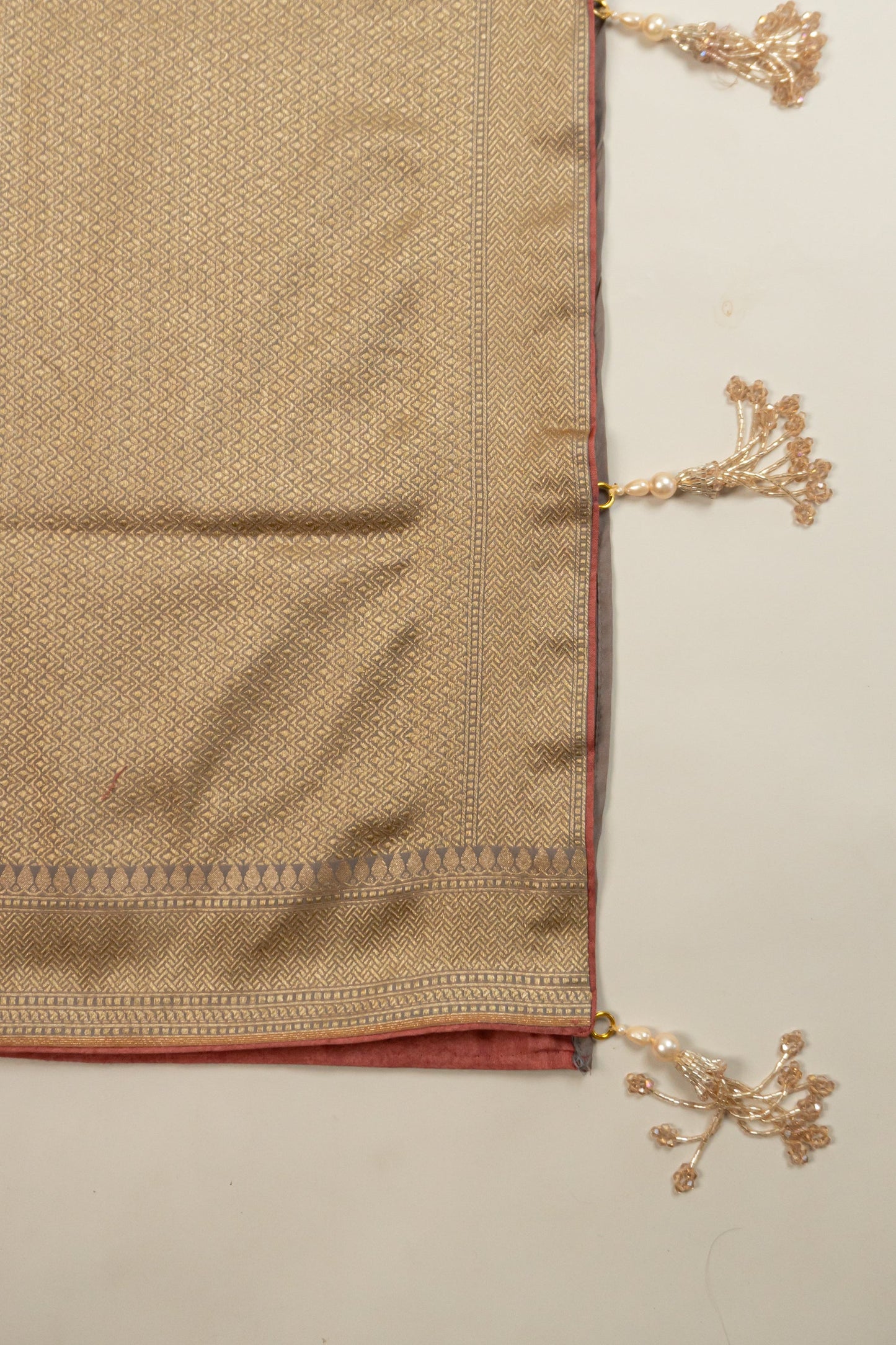 Grey, White, and Gold Banarasi Silk Saree with Butta, Plain Silk Facing, and Tassels on Pallu and Sleeves