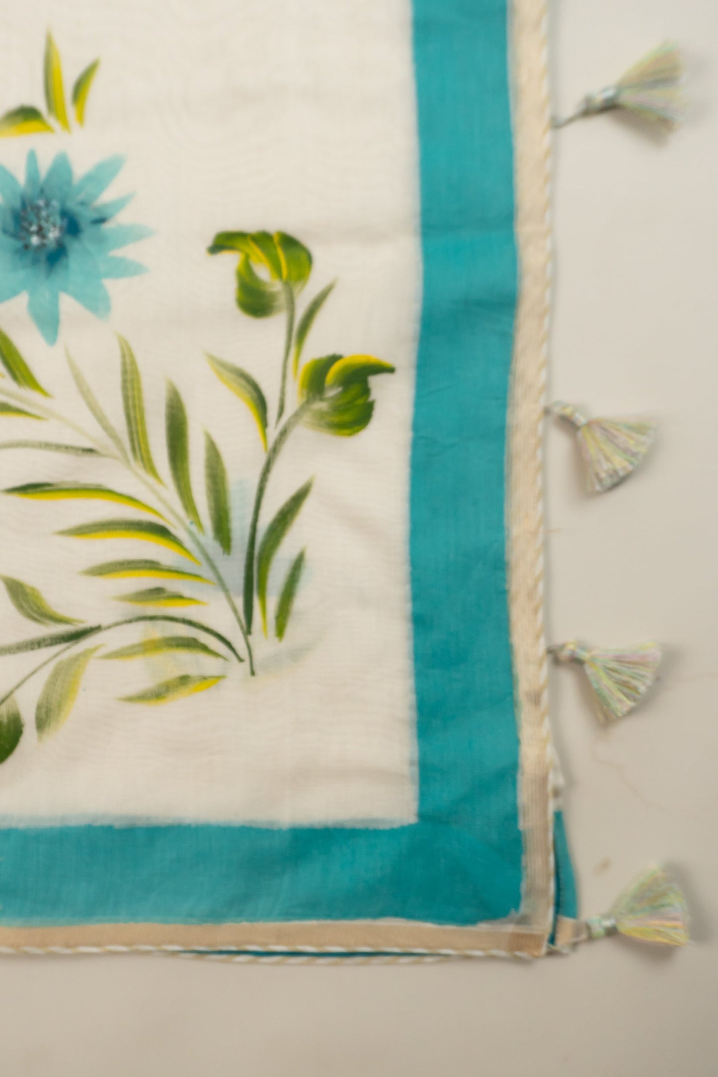 Natural White Cotton Mull Hand-Painted Saree with Lurex Tissue Piping, Facing, and Multi-Colored Tassels on Saree and Blouse