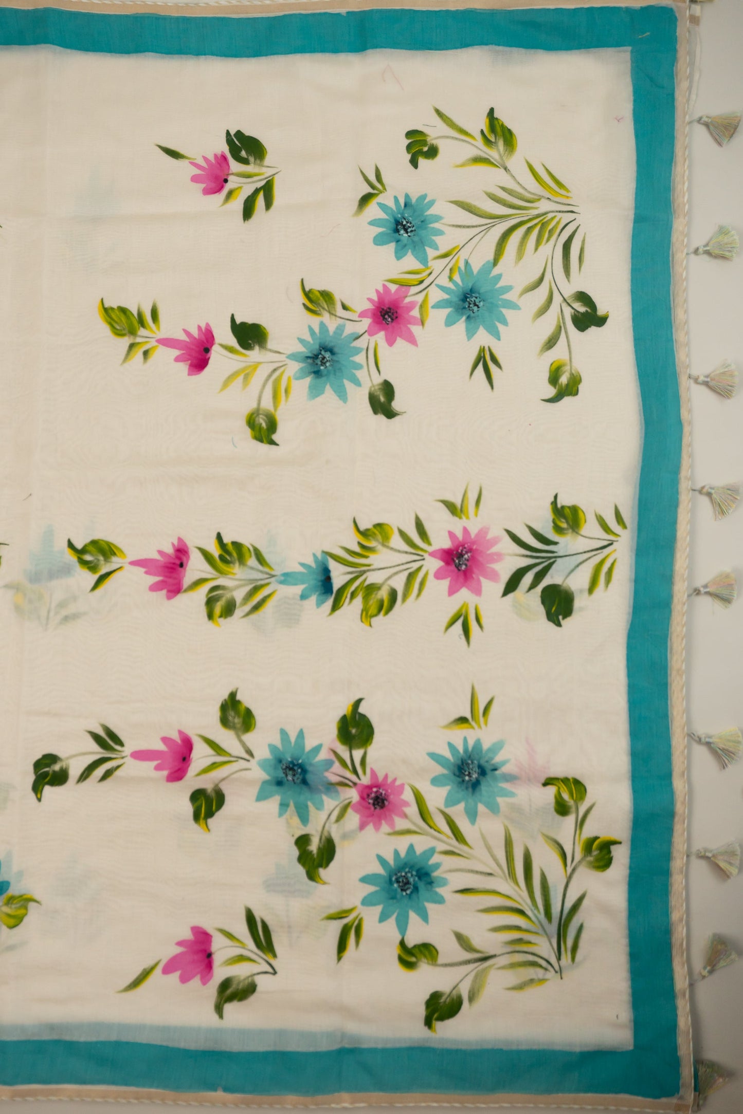Natural White Cotton Mull Hand-Painted Saree with Lurex Tissue Piping, Facing, and Multi-Colored Tassels on Saree and Blouse