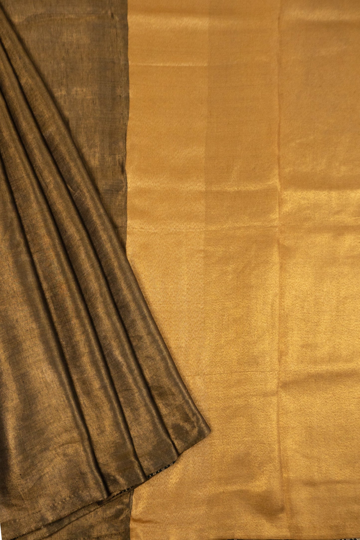 Metallic Gold Linen Saree with Brocade Facing and Decorative Hand-Embroidered Katdana Lace at the Pallu