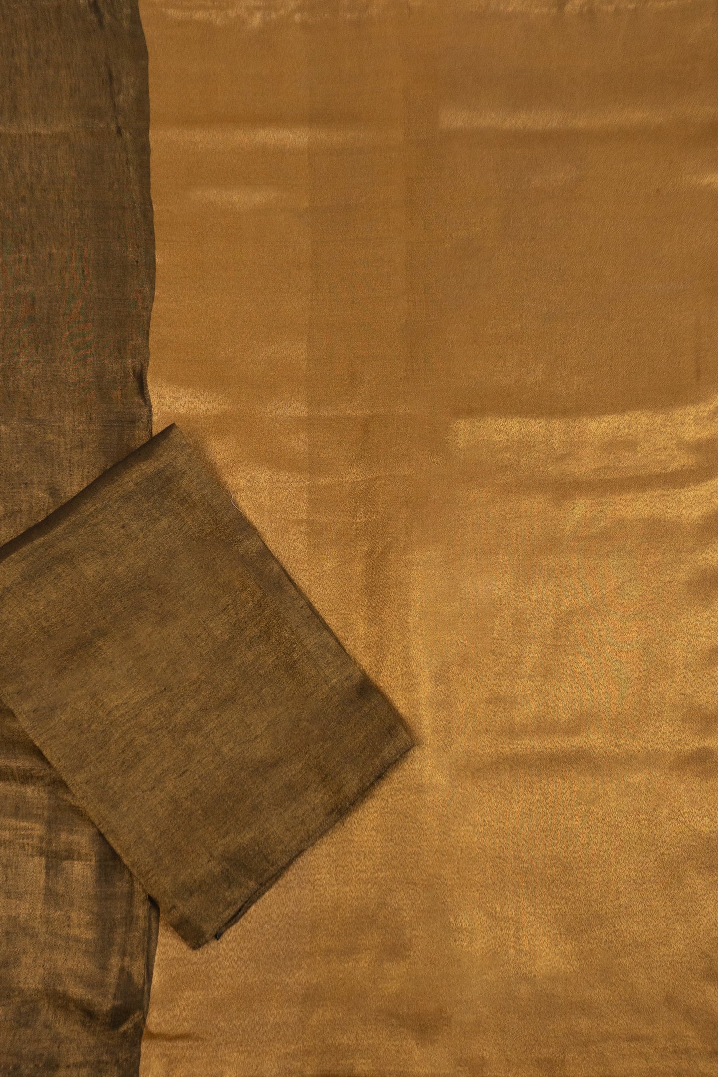 Metallic Gold Linen Saree with Brocade Facing and Decorative Hand-Embroidered Katdana Lace at the Pallu