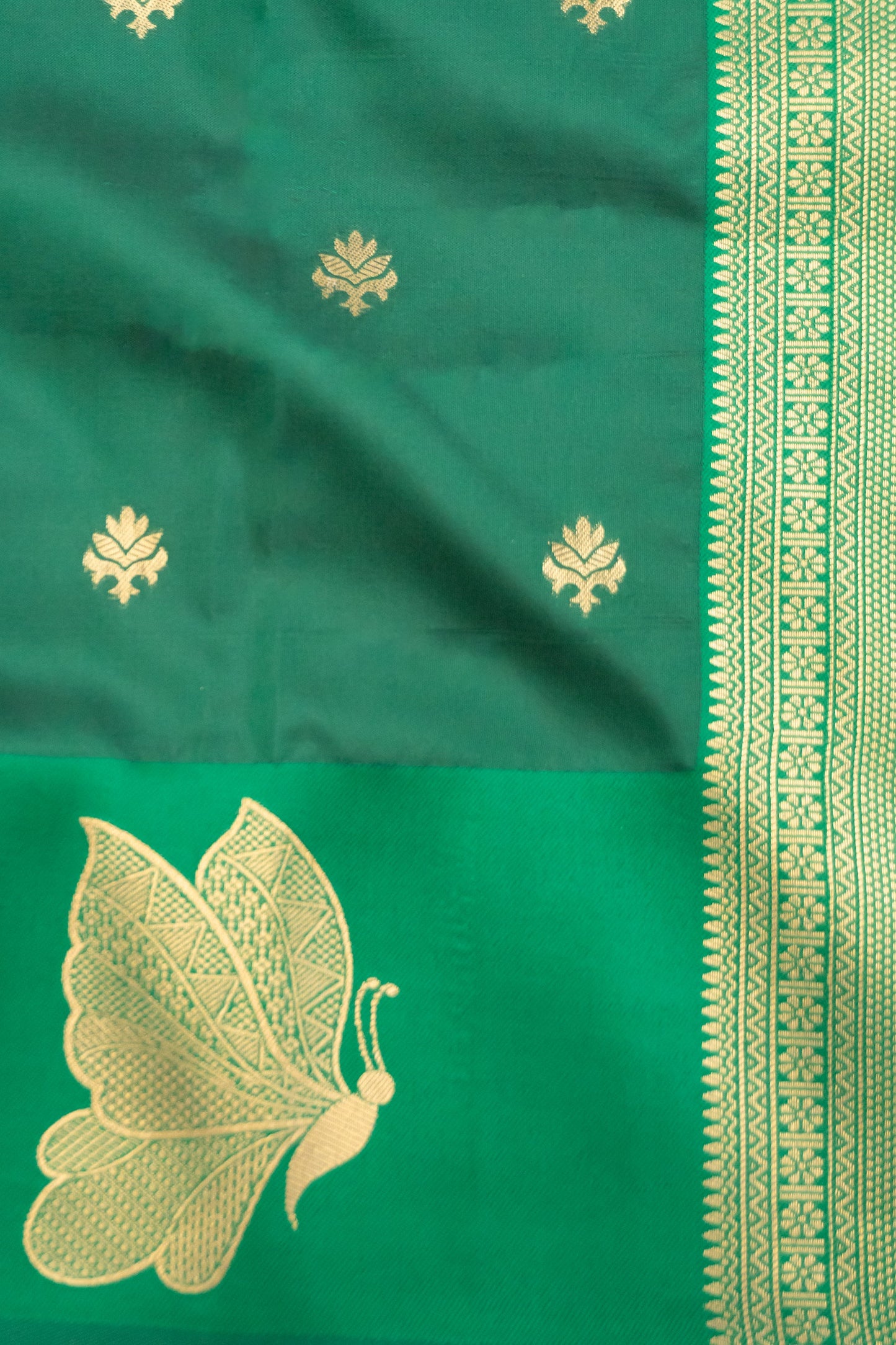 Bottle Green and Red Art Silk Saree with Butterfly Motif on Pallu and Bottom Hem, Featuring 10 Tassels in the Pallu
