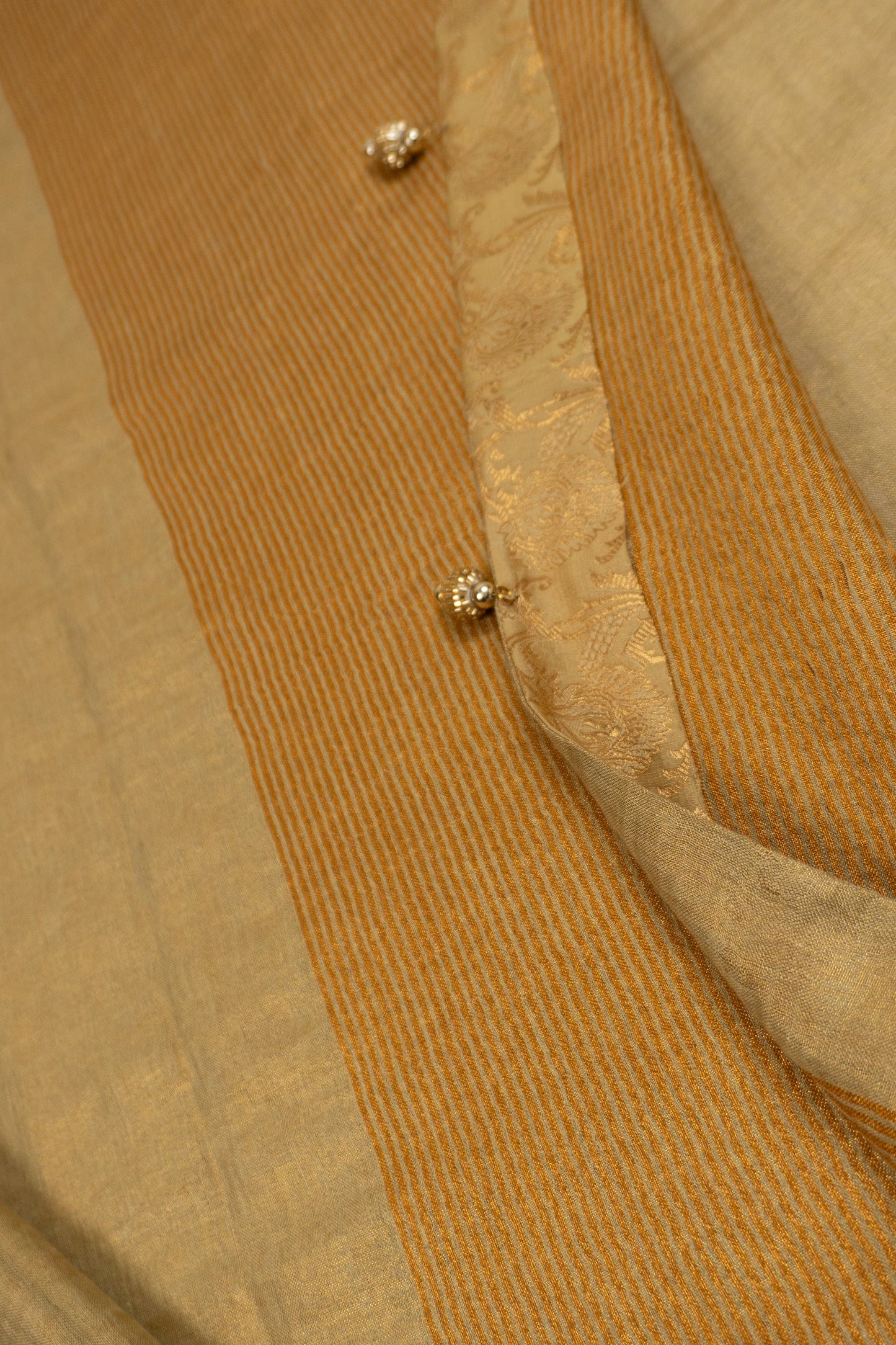 Gold Linen Saree with Art Silk Brocade Facing and Six Katdana Tassels