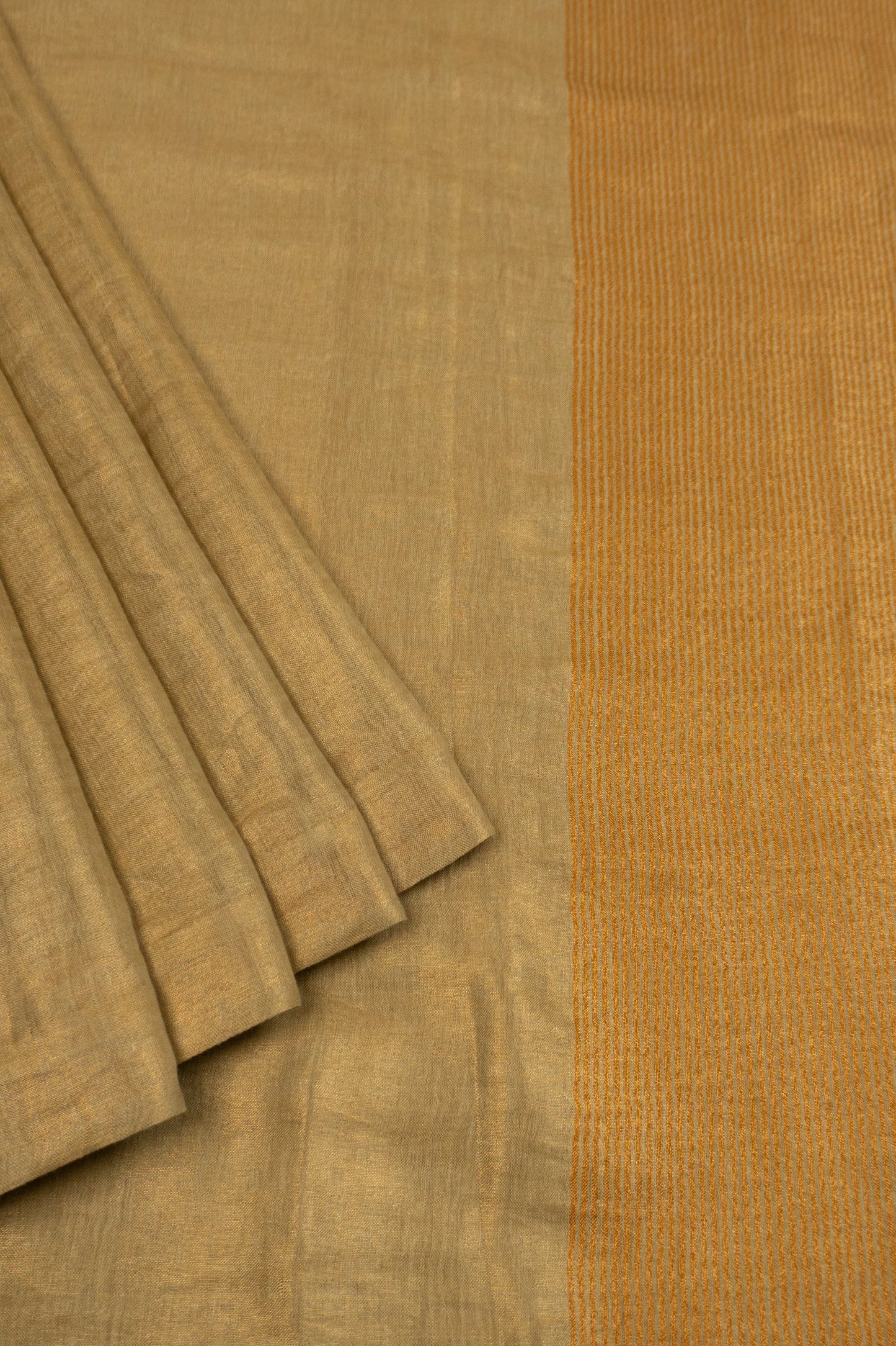 Gold Linen Saree with Art Silk Brocade Facing and Six Katdana Tassels