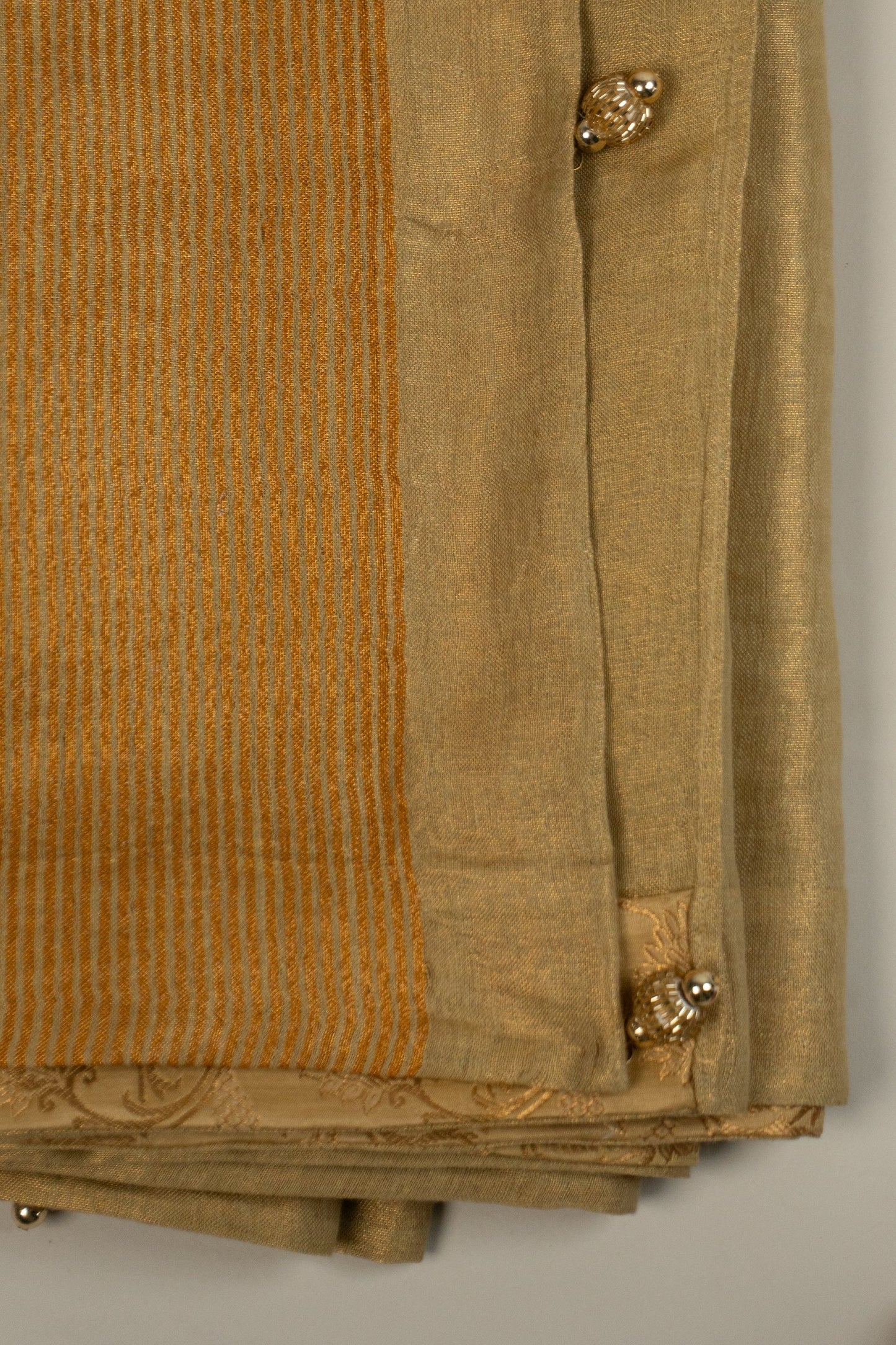 Gold Linen Saree with Art Silk Brocade Facing and Six Katdana Tassels