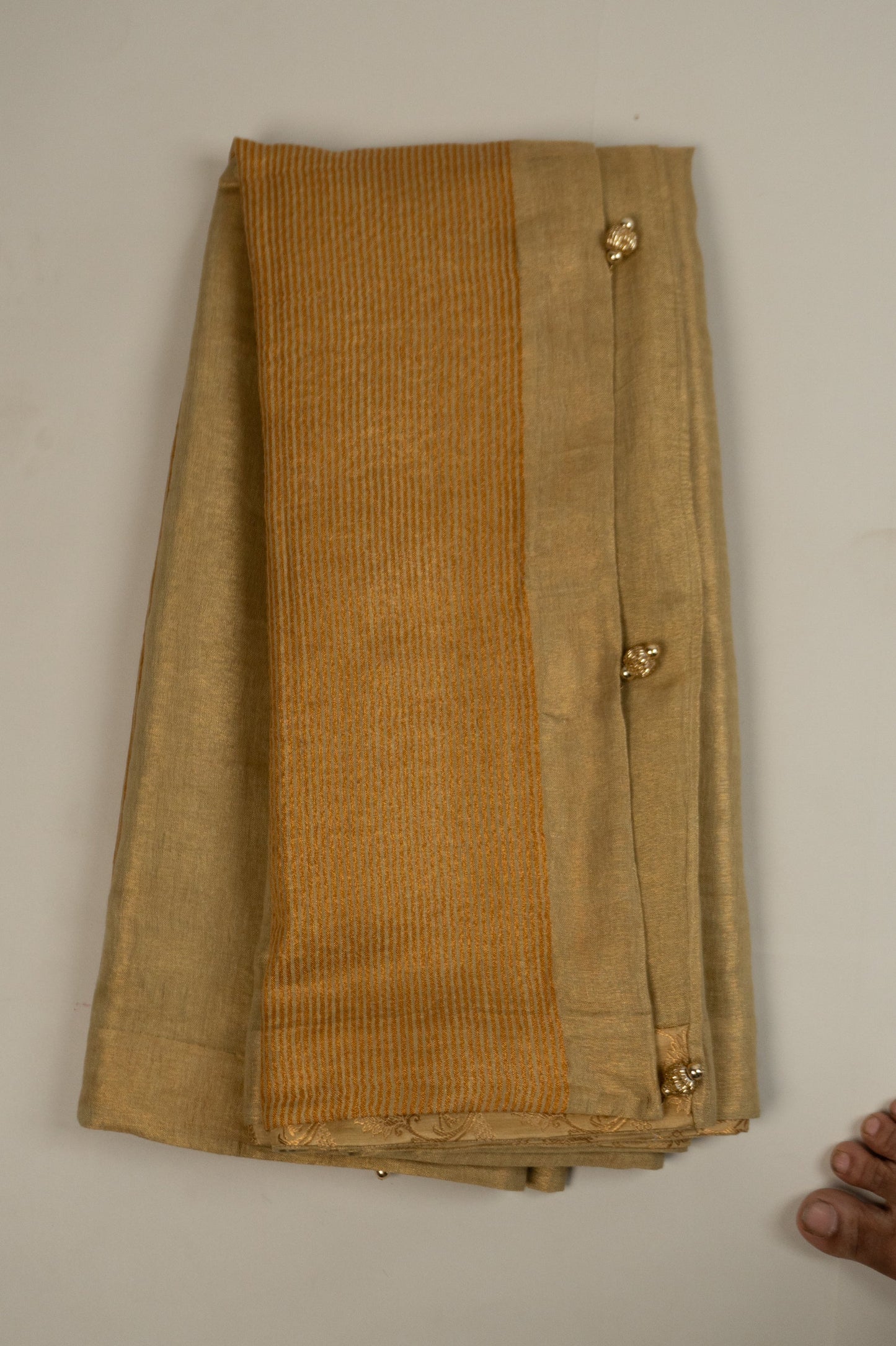 Gold Linen Saree with Art Silk Brocade Facing and Six Katdana Tassels