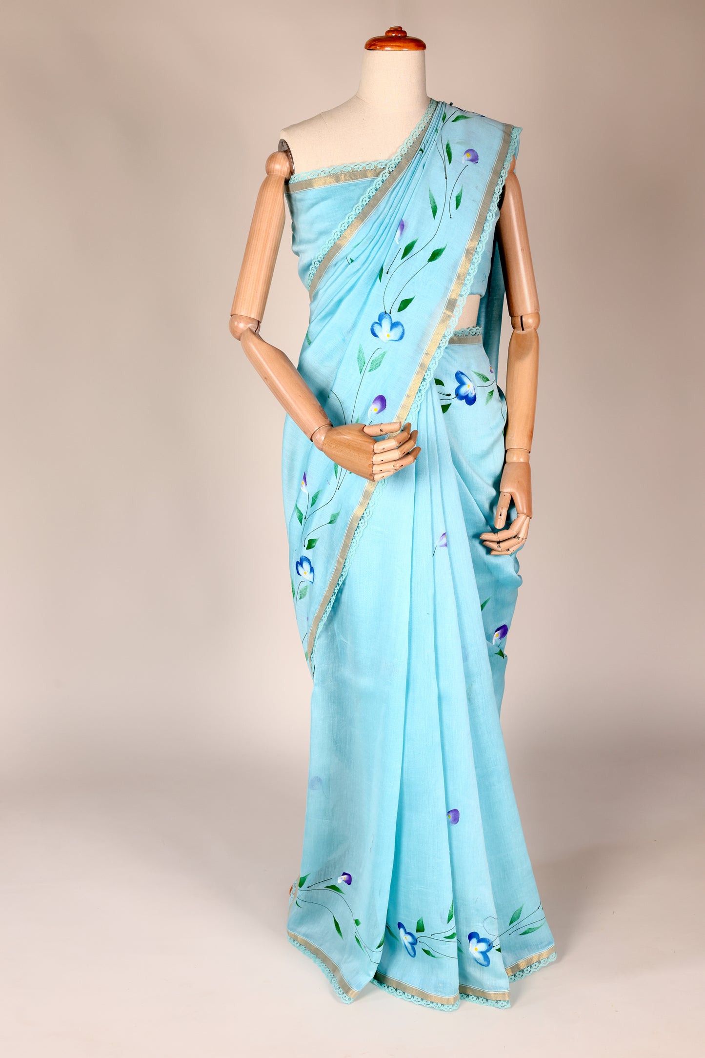 Sky Blue Hand‑Painted Cotton Saree with Lace Borders & Brocade Facing