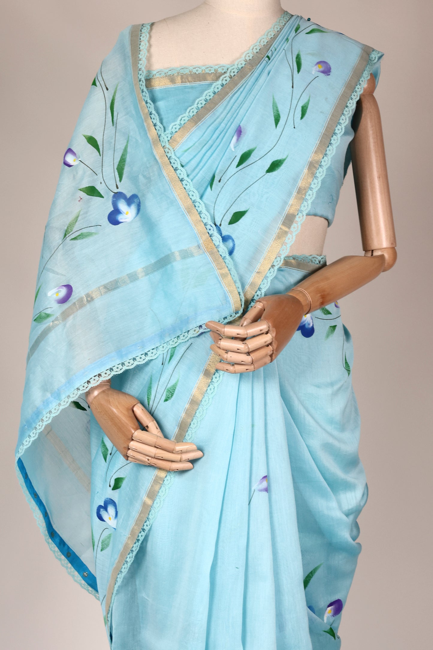 Sky Blue Hand‑Painted Cotton Saree with Lace Borders & Brocade Facing