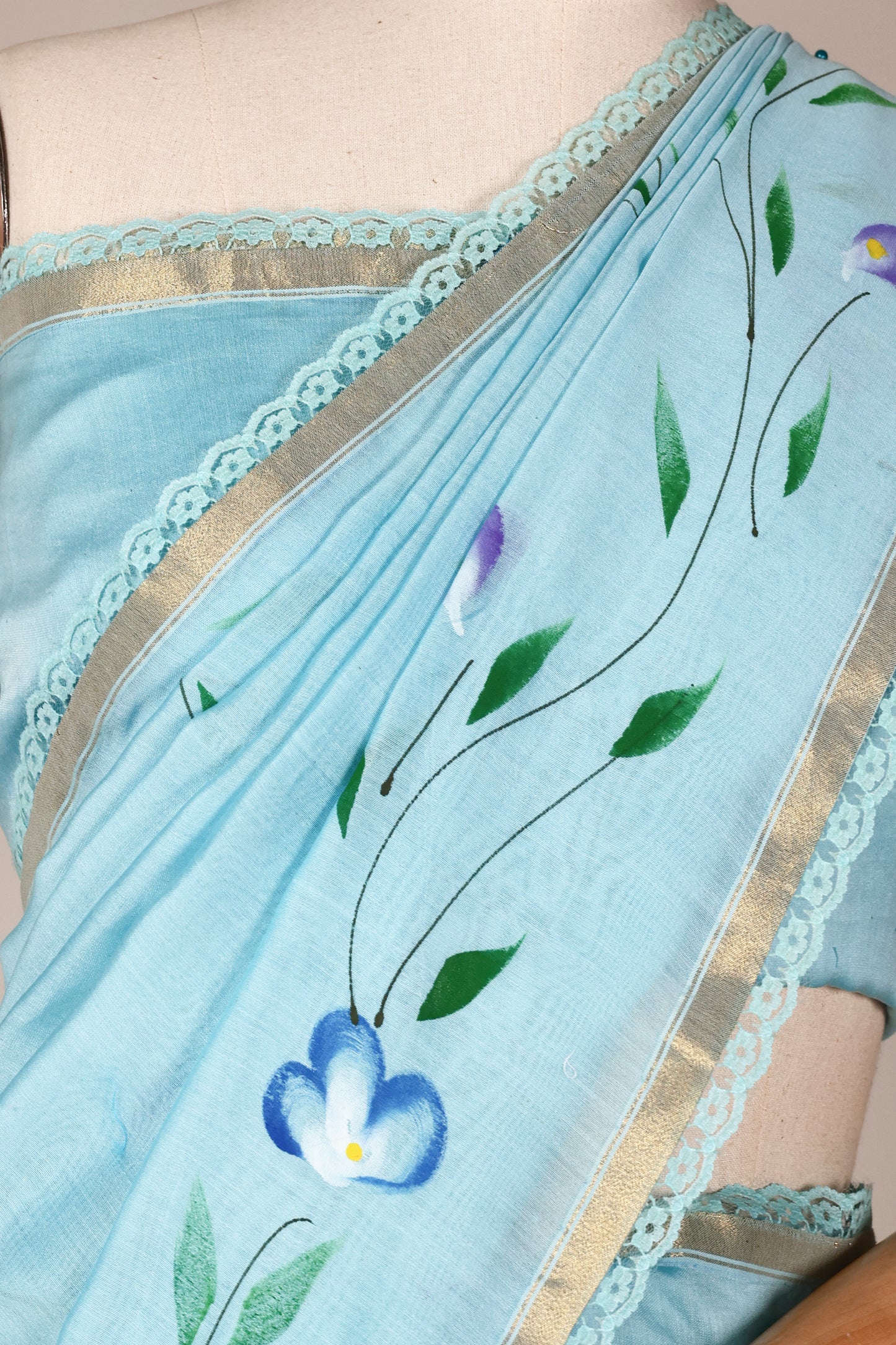 Sky Blue Hand‑Painted Cotton Saree with Lace Borders & Brocade Facing
