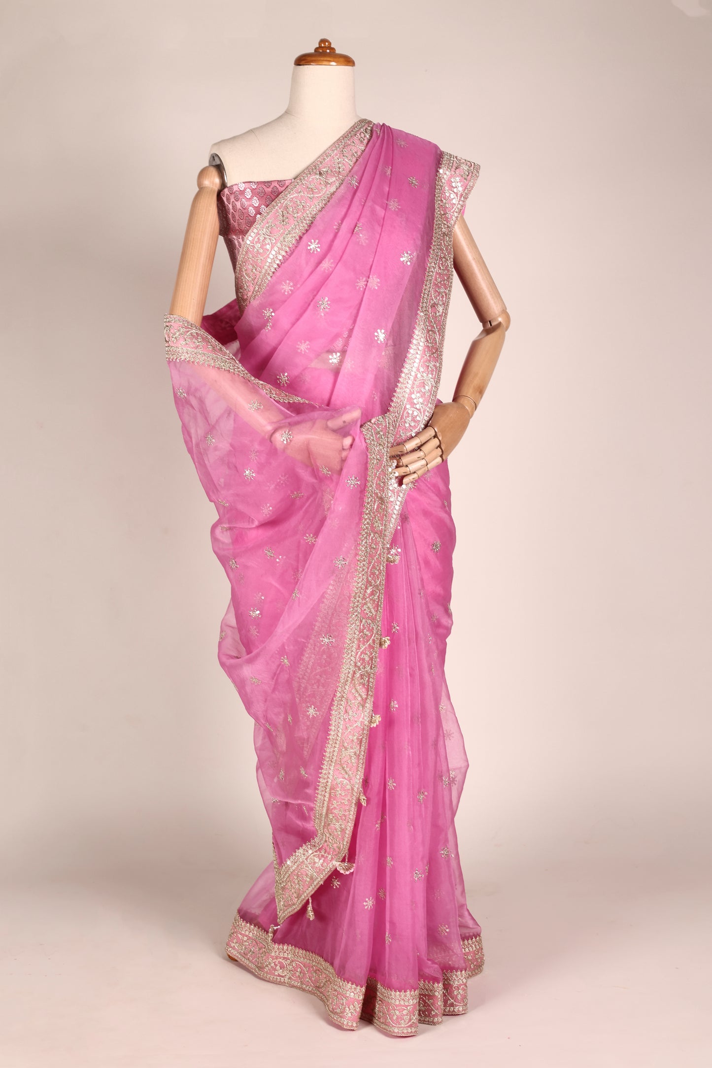 Rani Pink Organza Saree with Mukesh Work, Lace Borders & Tassel Detailing
