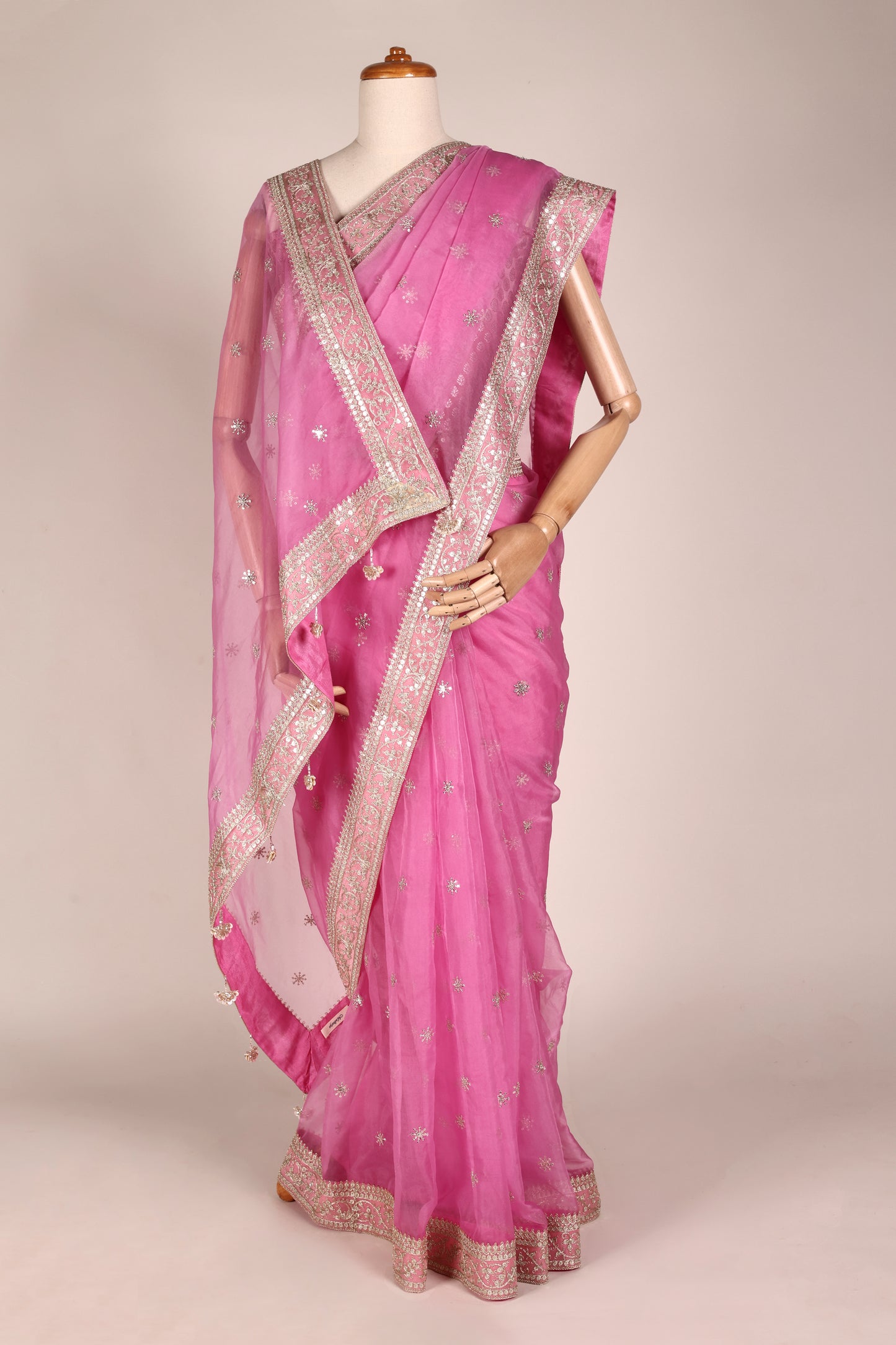 Rani Pink Organza Saree with Mukesh Work, Lace Borders & Tassel Detailing