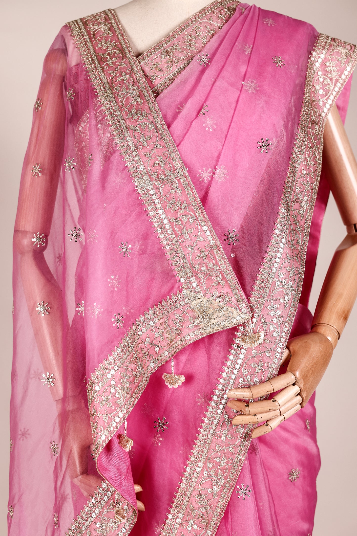 Rani Pink Organza Saree with Mukesh Work, Lace Borders & Tassel Detailing