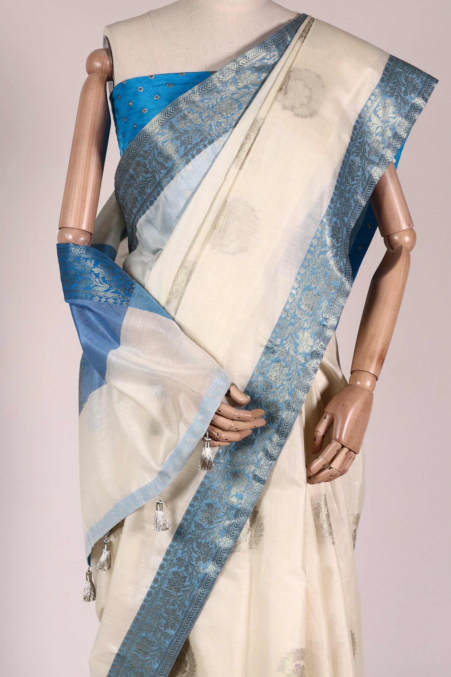 Off‑White & Sky Blue Banarasi Art Silk Saree with Intricate Weave, Brocade Facing & Zari Tassels